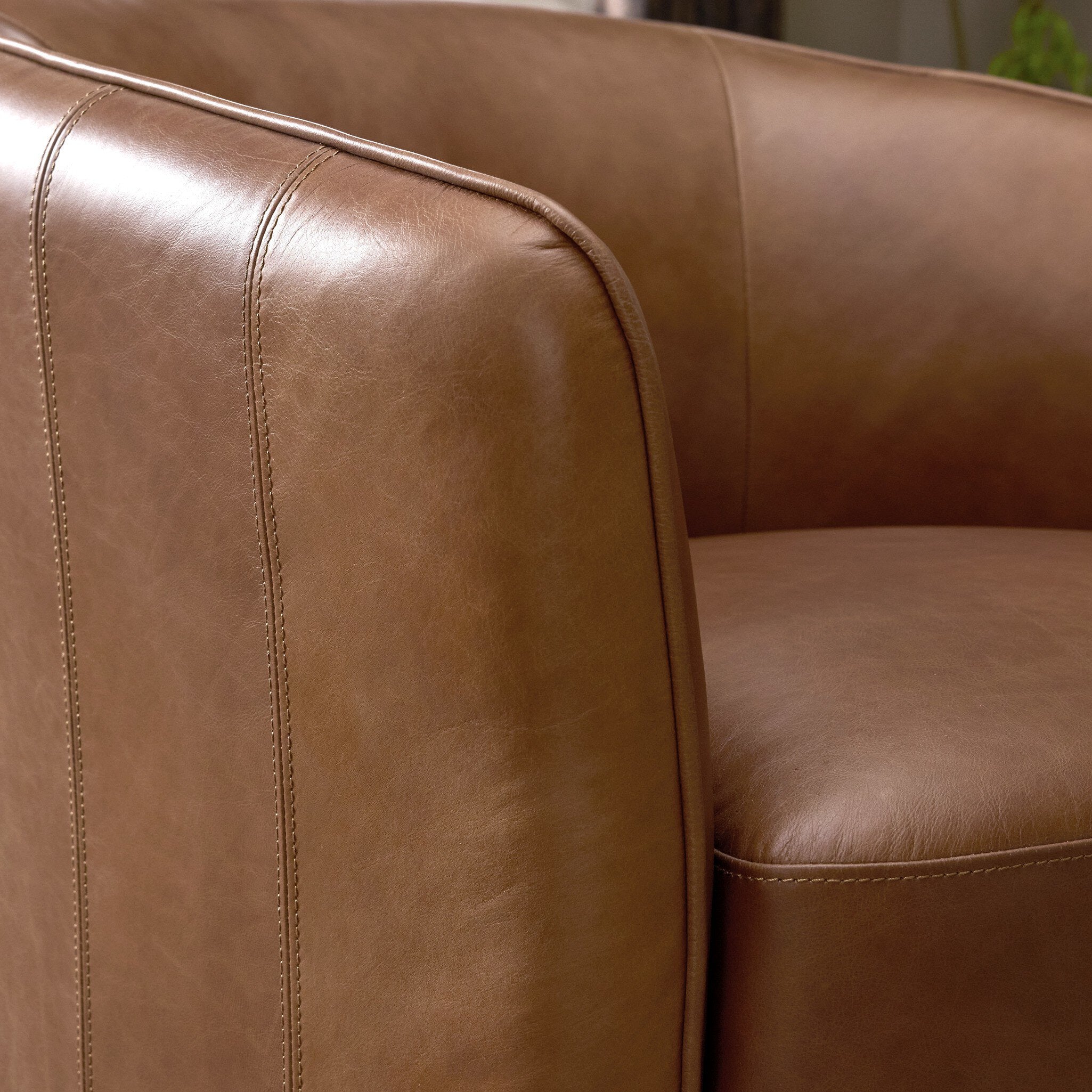 Four Hands Rodgers Sonoma Chestnut Swivel Chair close-up detail 5