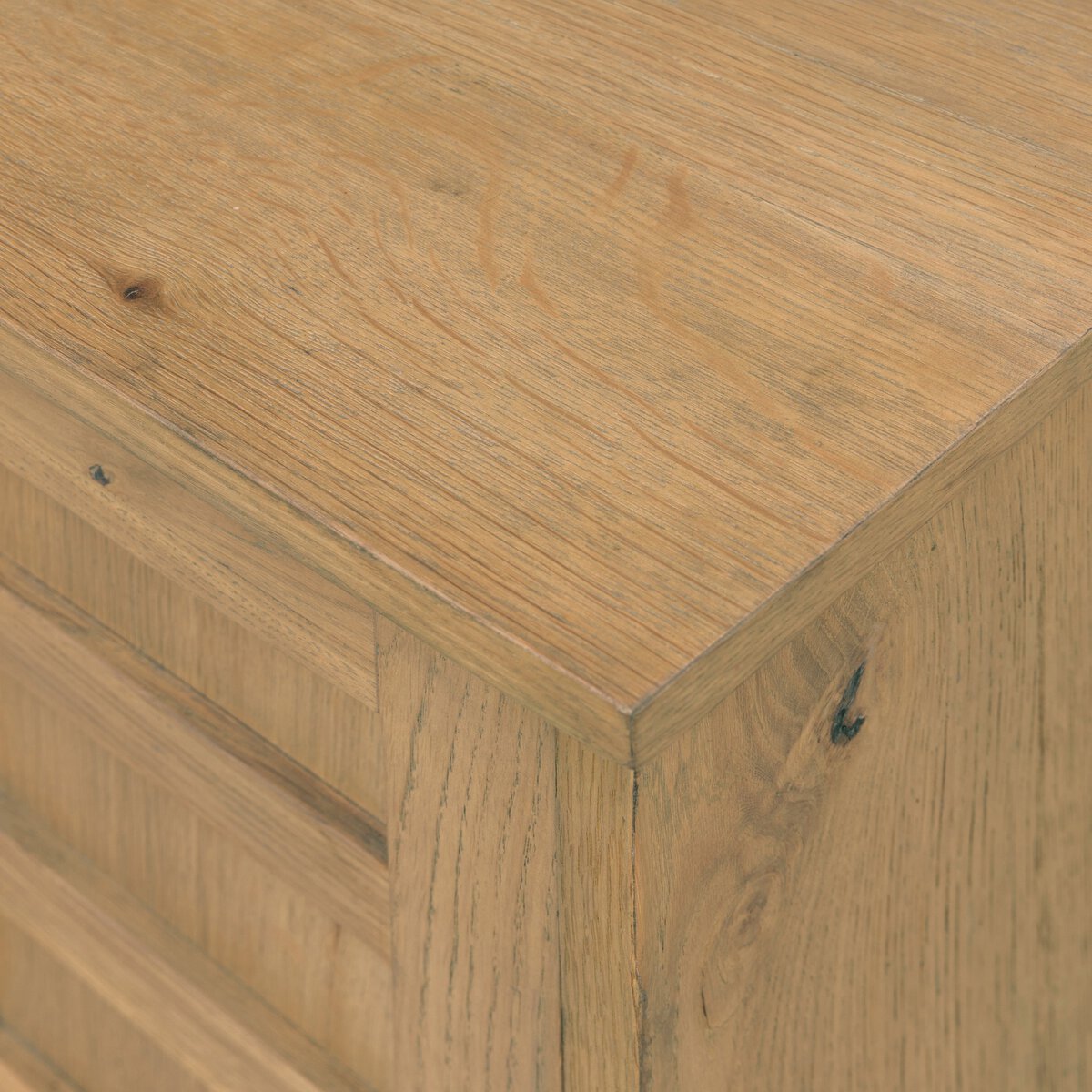 Four Hands Alessio Nightstand right orientation in aged natural oak, close-up detail of grid door, view 2