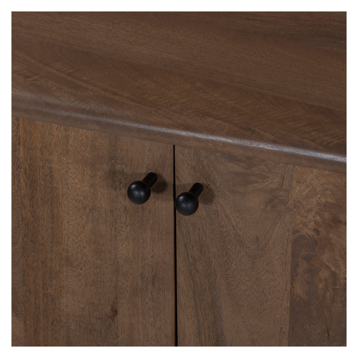 Four Hands Tindra Washed Taupe Sideboard in curved solid mango with tapered legs, close-up detail of tapered leg