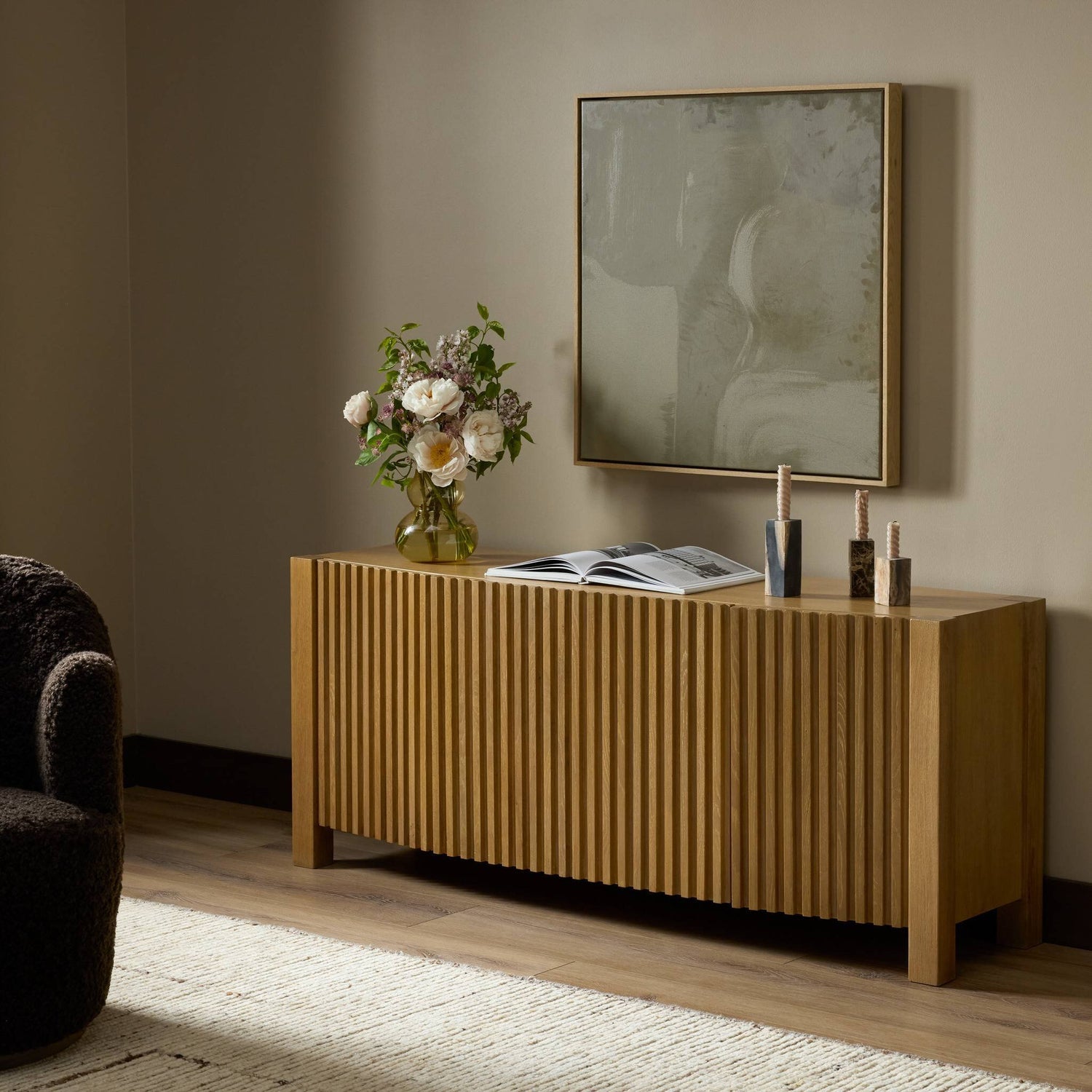 Four Hands Tristan Light Natural Oak Media Console styled in a room setting