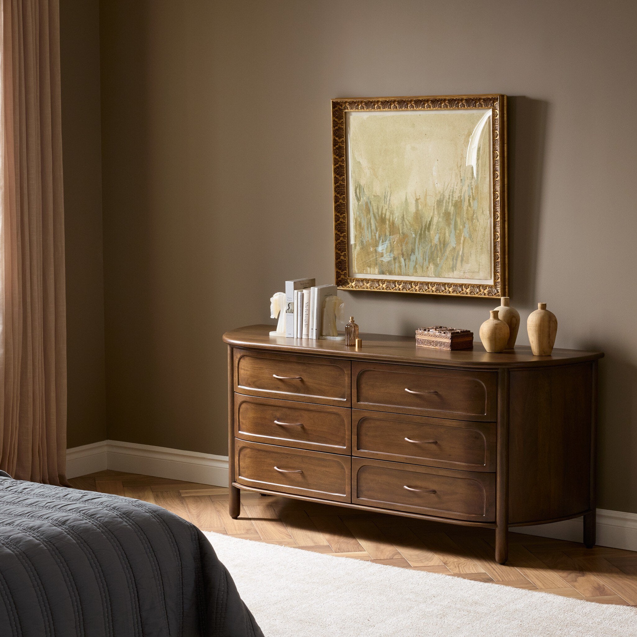 Four Hands Divion Warm Brown Mango 6 Drawer Dresser styled in a room setting