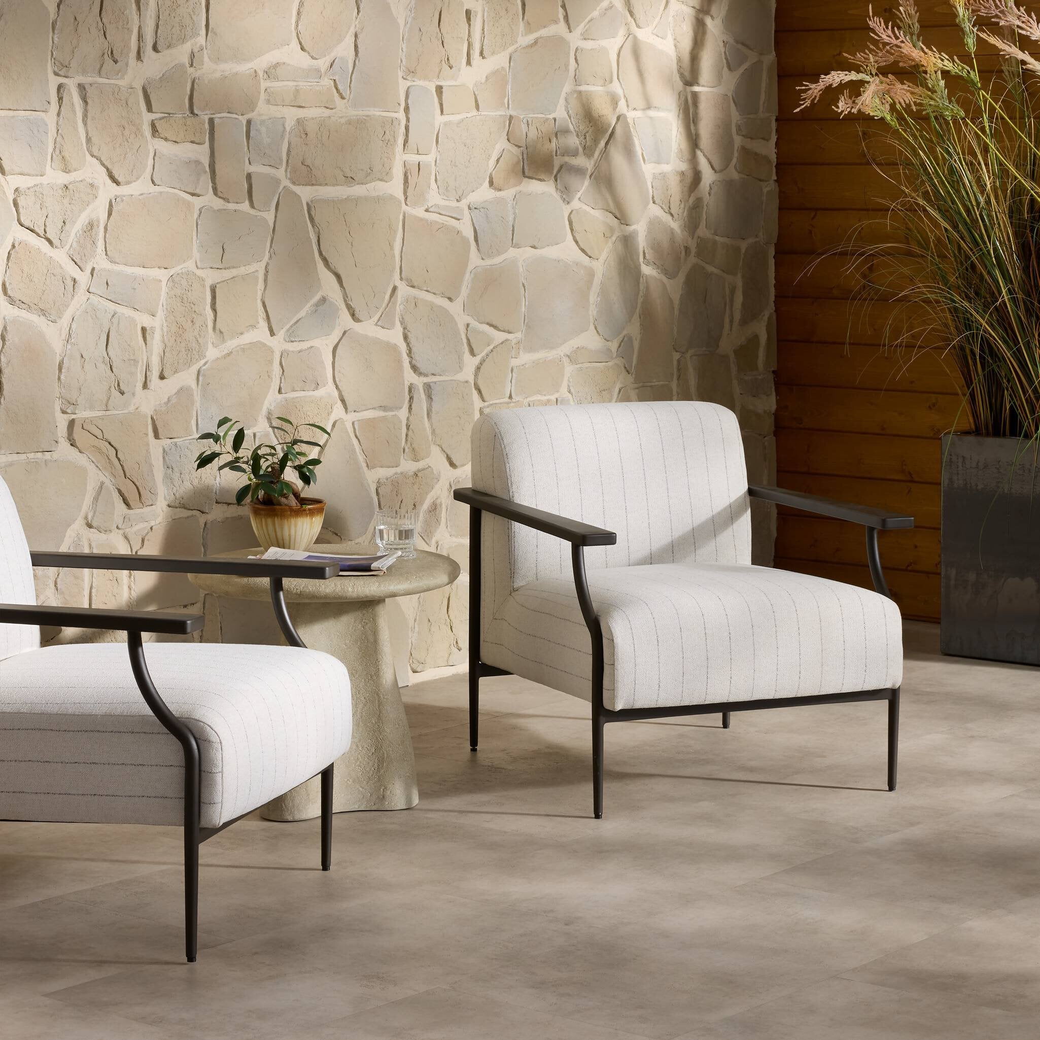Four Hands Haverford Amalfi Natural Outdoor Chair — in a styled room setting