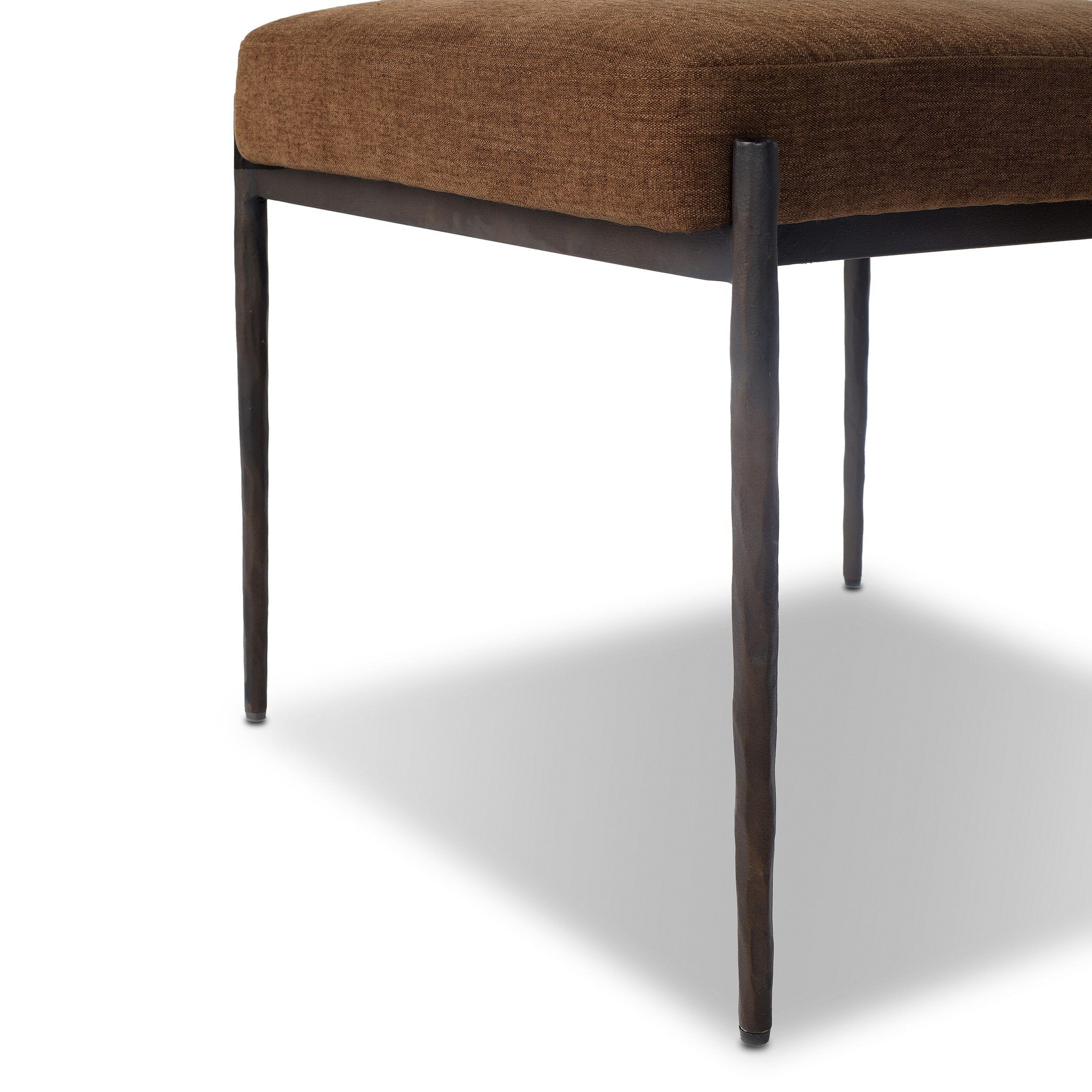 Four Hands Jazelle Laughlin Ochre Metal Dining Chair with amber shearling seat, close-up detail of shearling, view 3