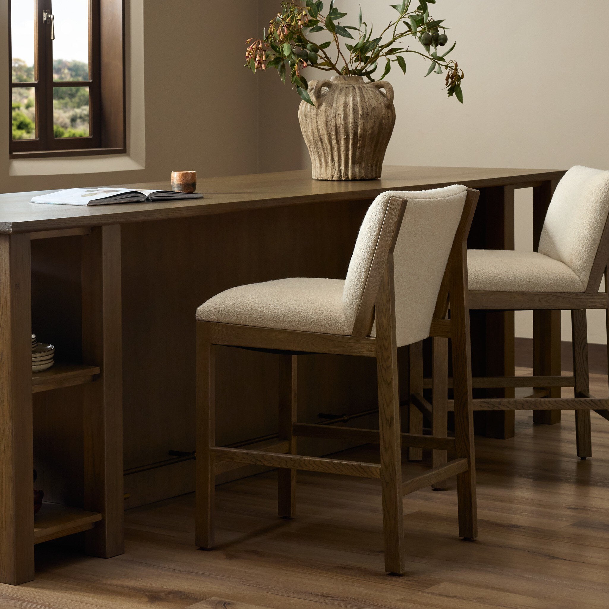 Four Hands Gables Crete Sand Counter Stool — in a styled room setting