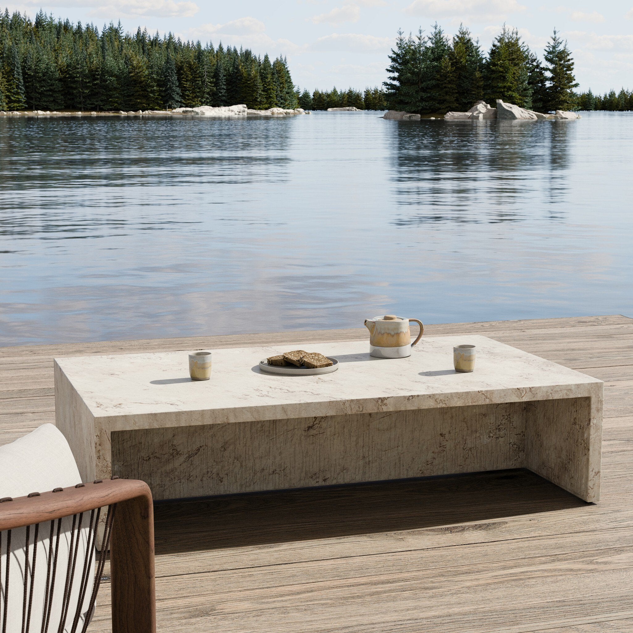 Four Hands Ludlow Natural Veined Concrete Outdoor Coffee Table — in a styled room setting
