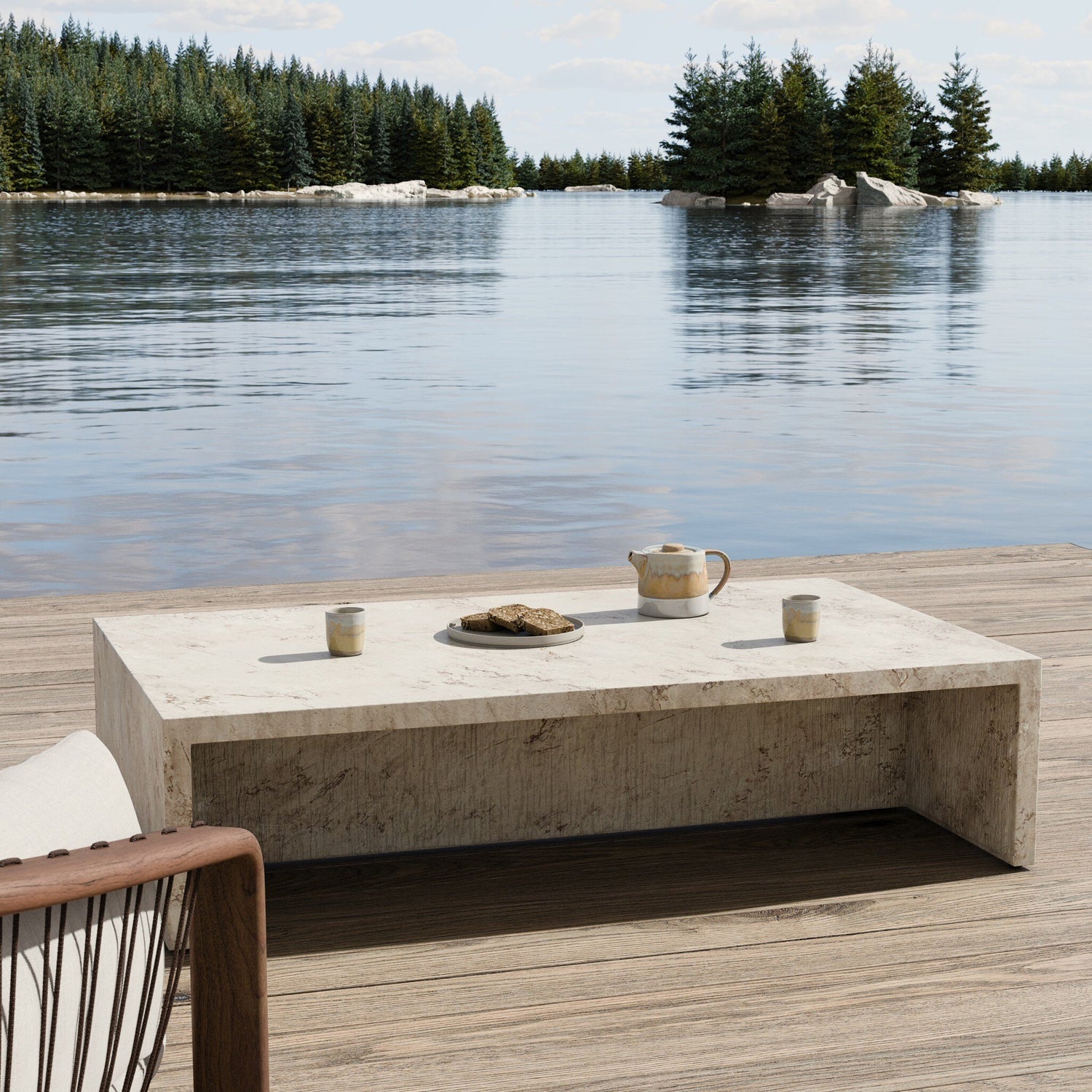 Four Hands Ludlow Natural Veined Concrete Outdoor Coffee Table — in a styled room setting