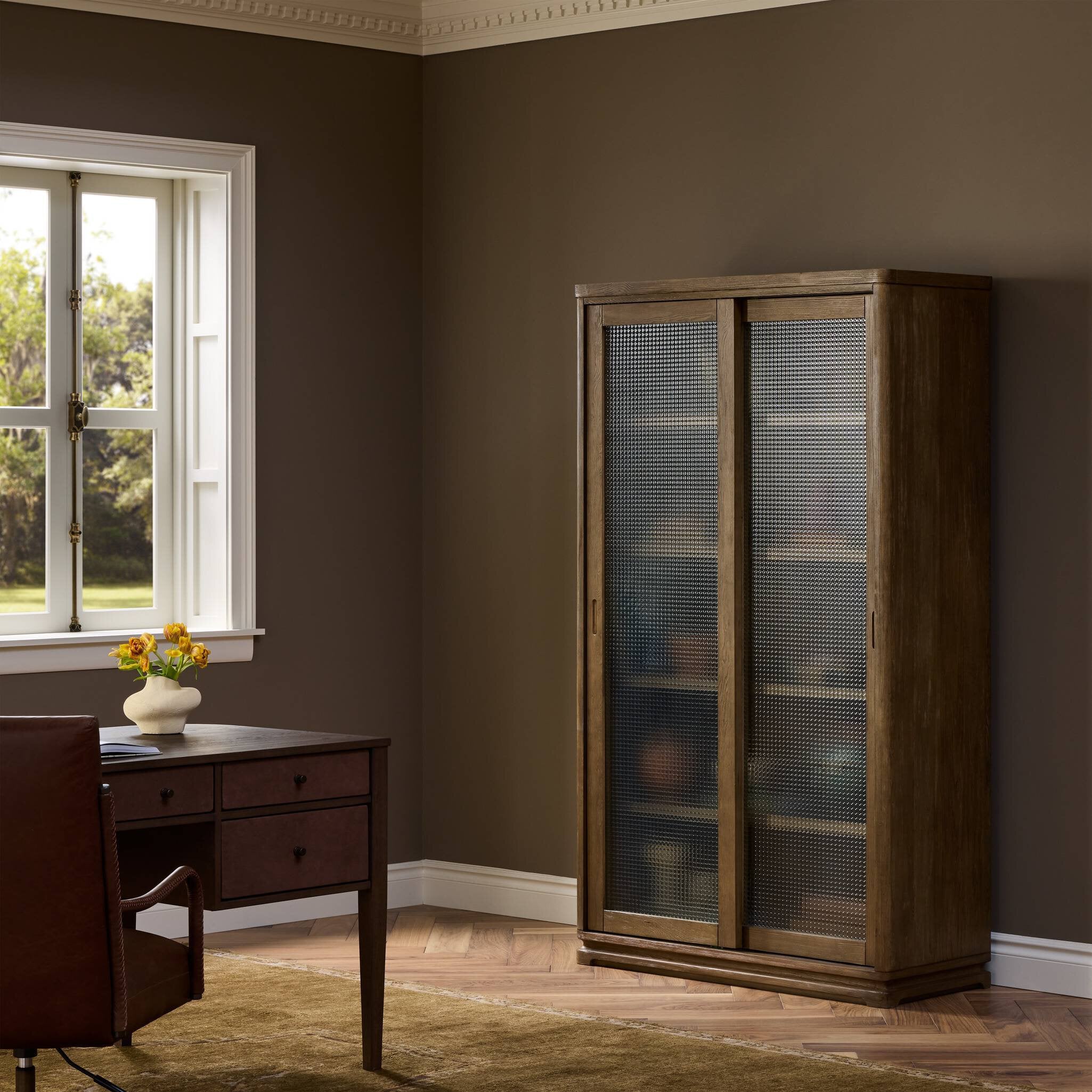 Four Hands Foster Sandy Hemlock Cabinet styled in a room setting, hardware and joinery