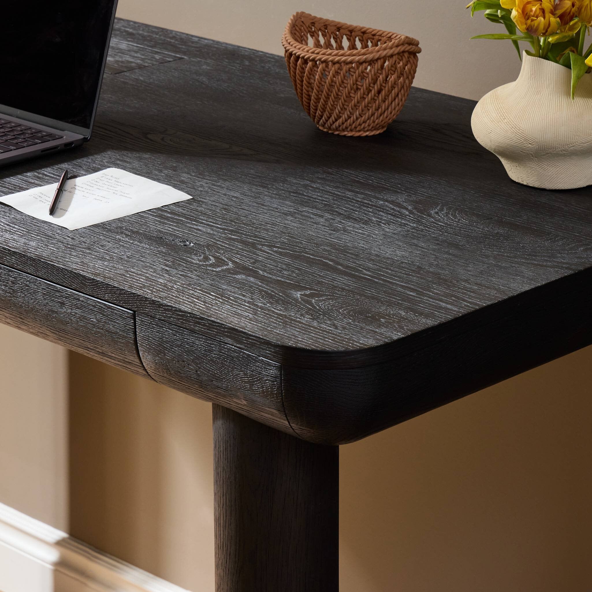 Four Hands Taylor Worn Black Oak Standing Desk — base and legs