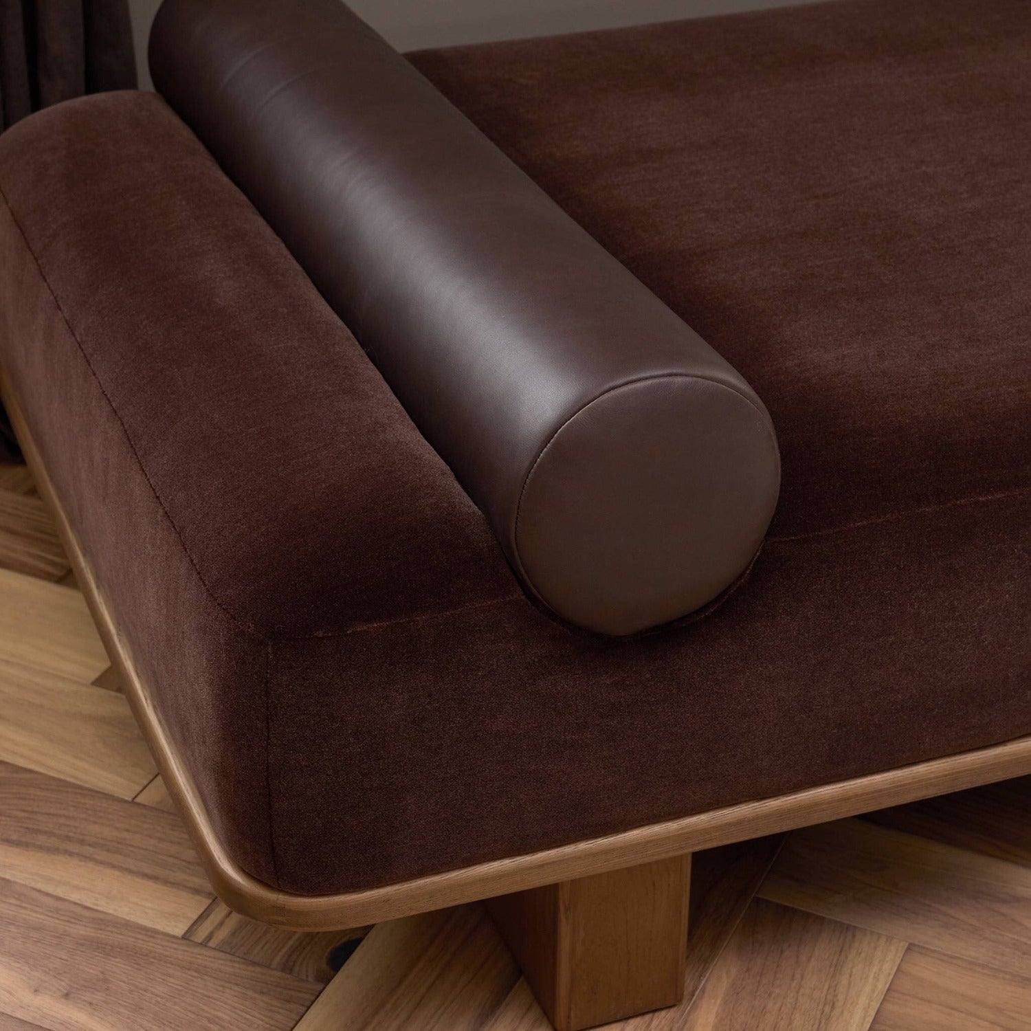 Four Hands Teia Monte Chocolate Chaise with wool-leather mix on drifted ash ski legs, alternate styled view