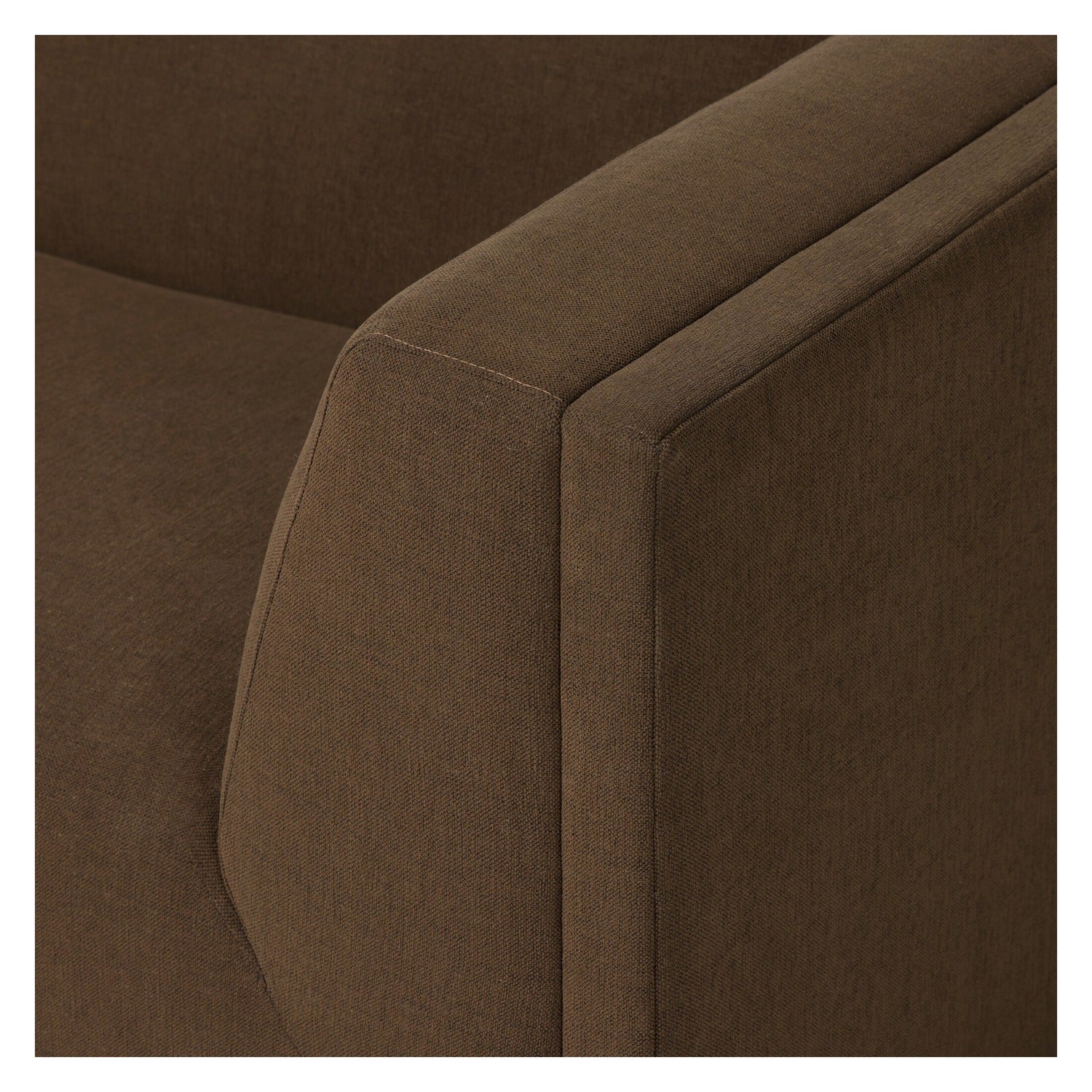 Four Hands Vince Crypton Nomad Mushroom 94in Tuxedo Sofa on wood plinth, close-up detail of mitered corner, view 1