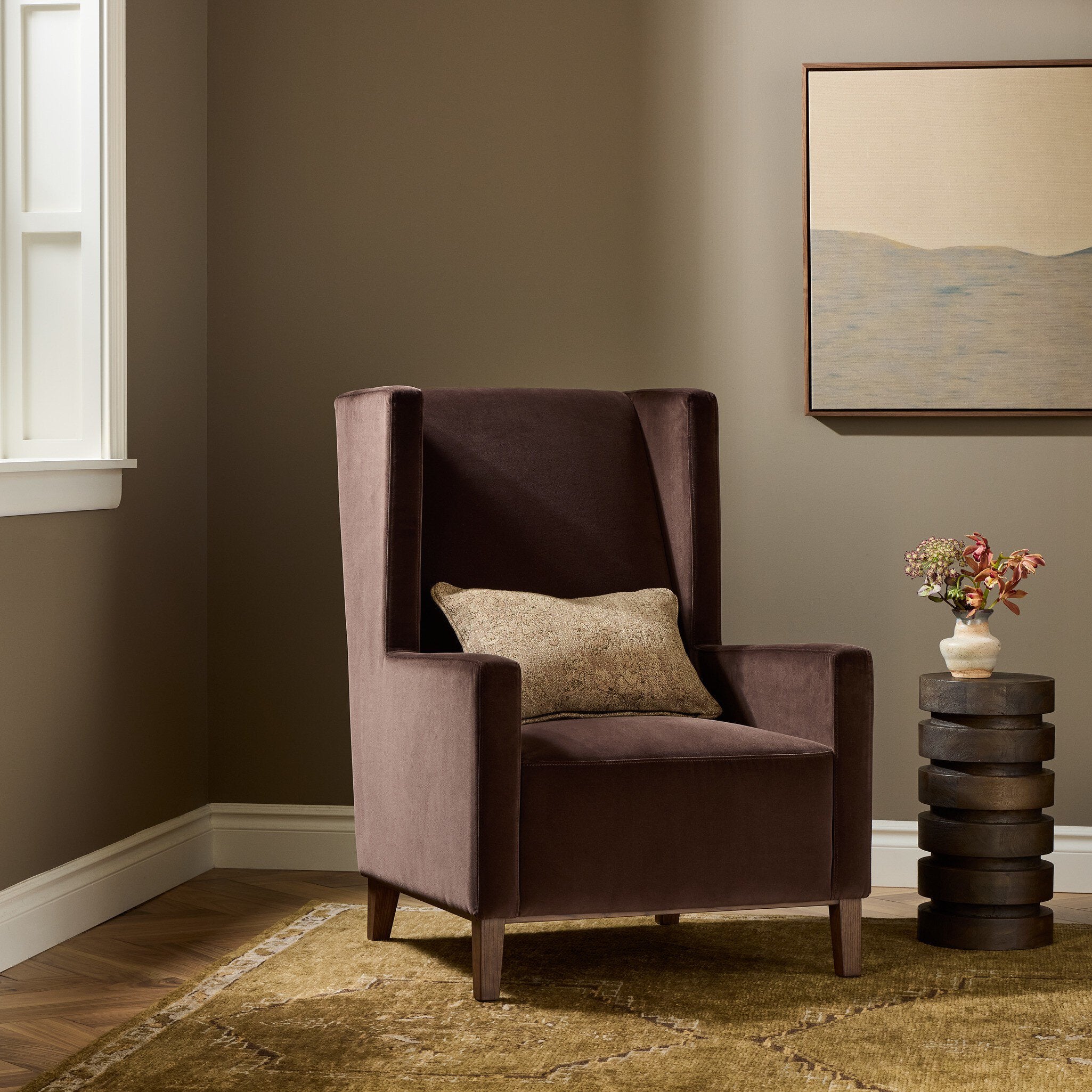 Four Hands Savita Surrey Cocoa Wing Chair styled in a room setting
