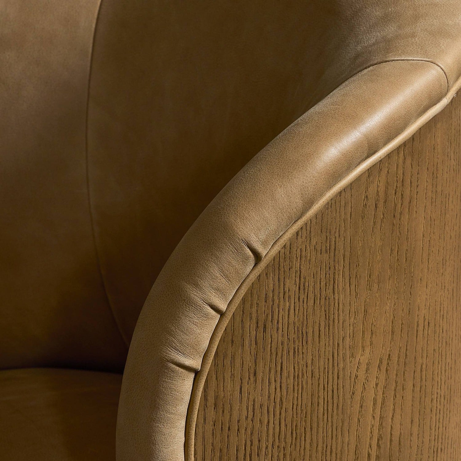 Four Hands Trisha Palermo Drift Swivel Chair in leather with wood-wing back on amber ash, alternate styled view