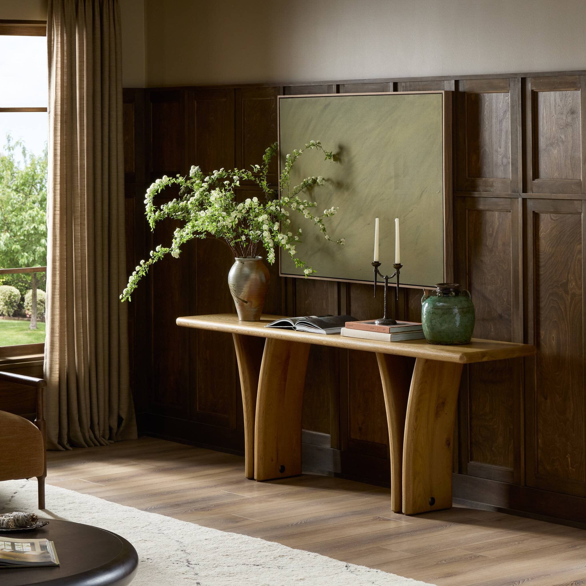 Four Hands Marcon Natural Reclaimed French Oak Console Table styled in a room setting