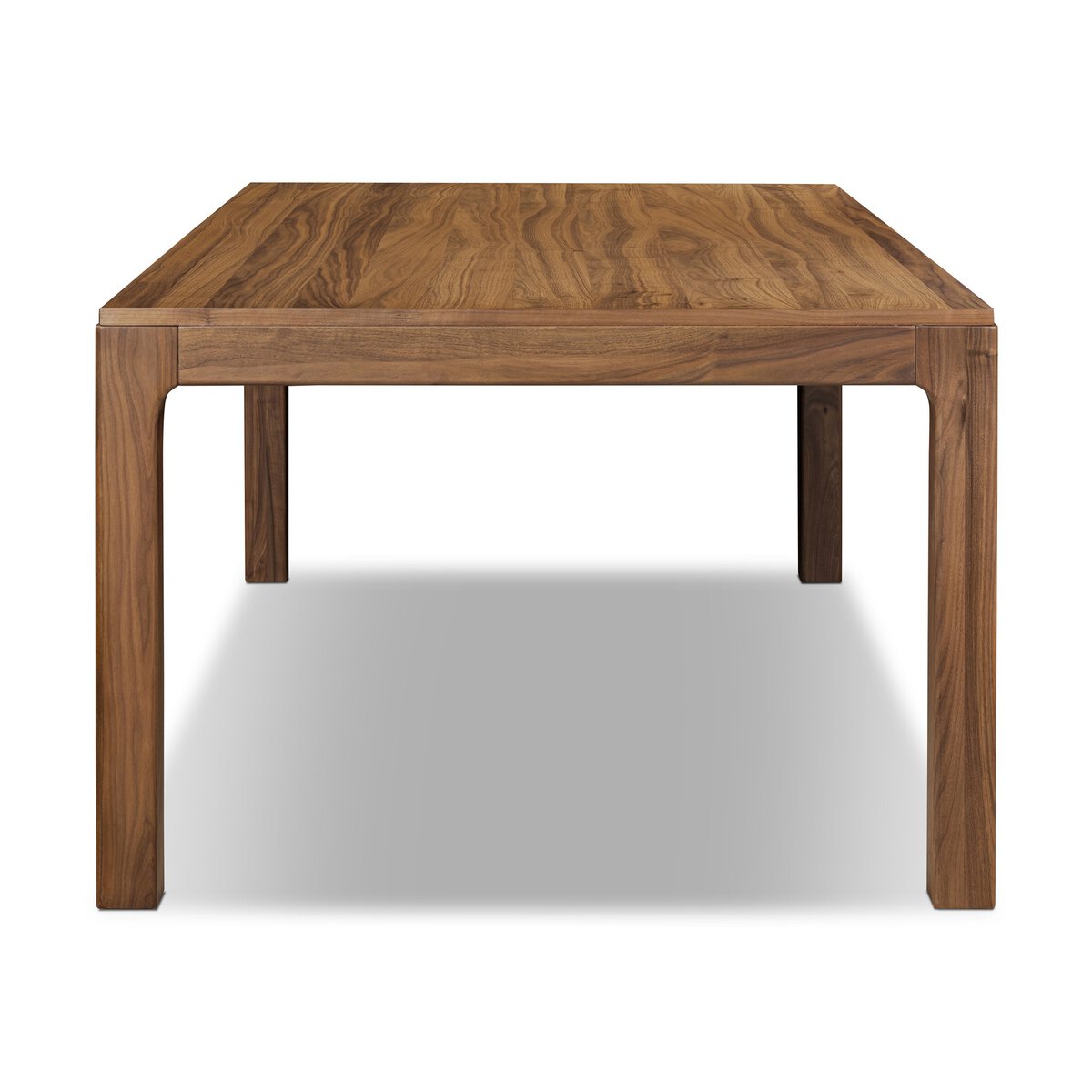 Four Hands Arturo 78in Dining Table in natural walnut, side profile view