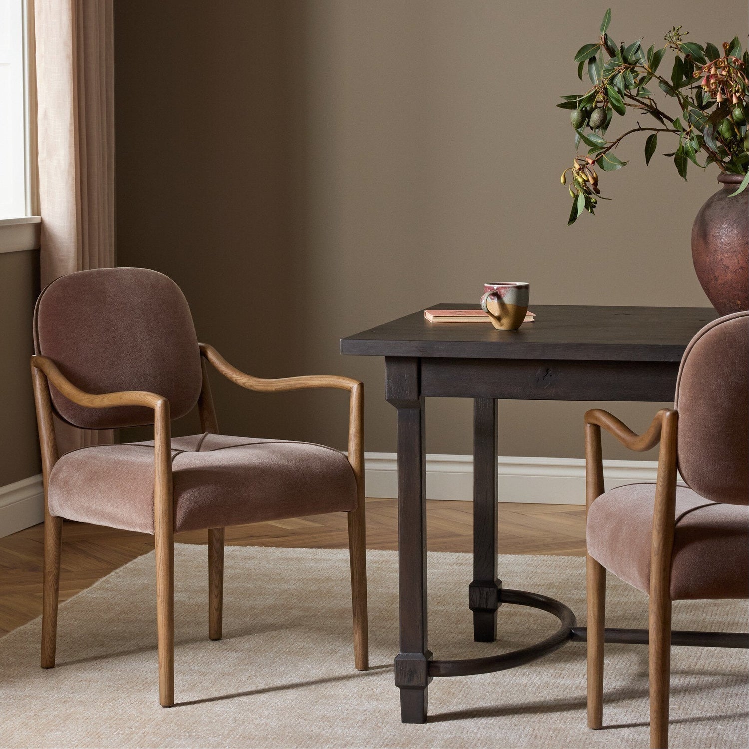 Four Hands Auden Monte Mushroom Dining Arm Chair in a styled room setting
