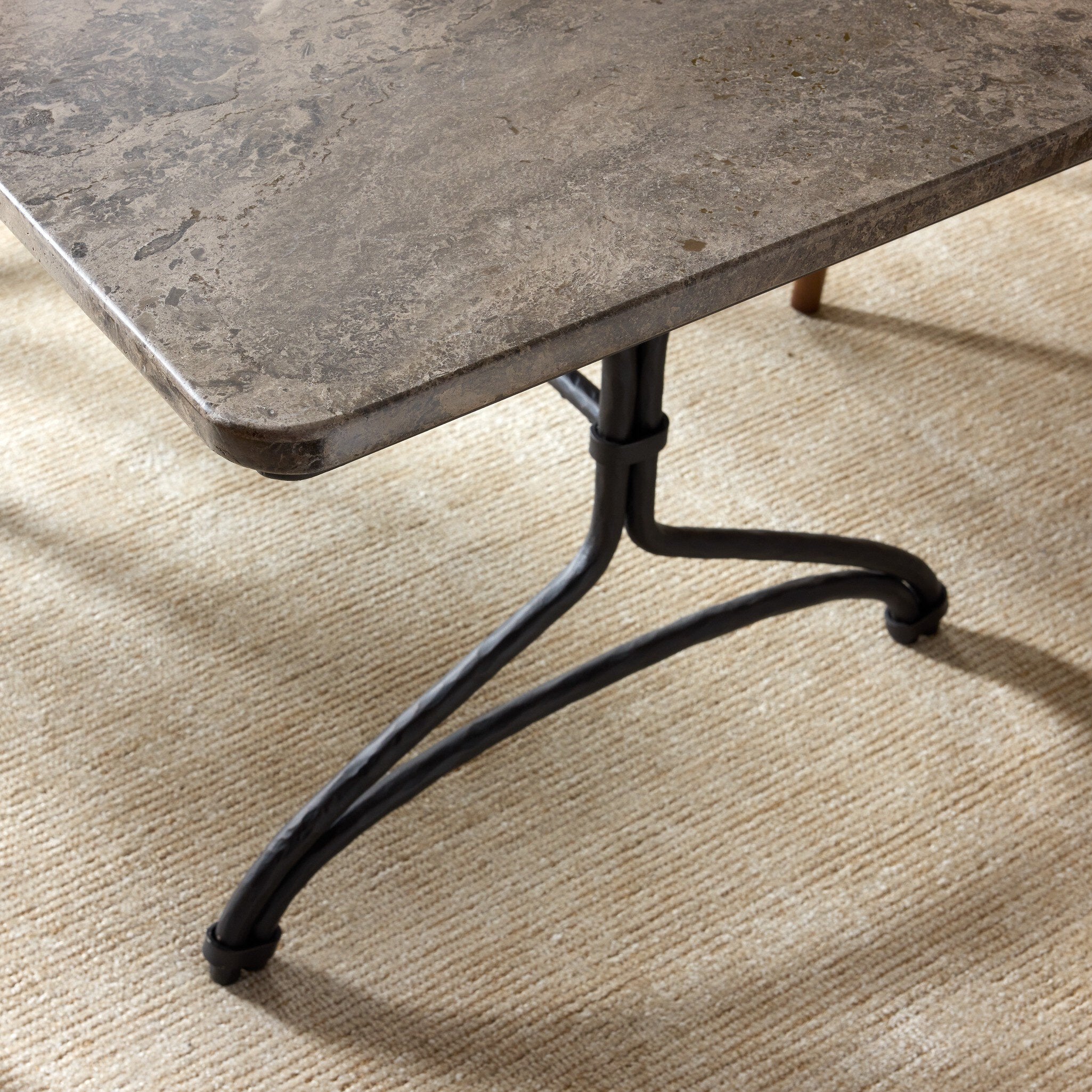 Four Hands Nyssa Warm Grey Marble Dining Table close-up detail 5