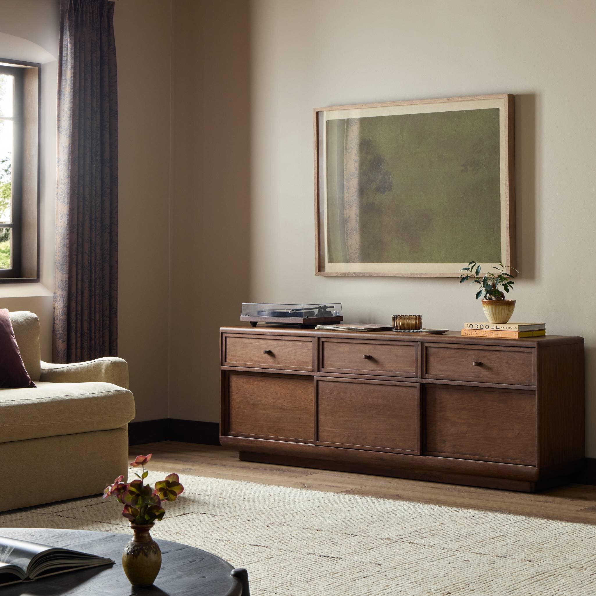 Four Hands Vincent Dark Brown Walnut Media Console w/Record Storage styled in a room setting