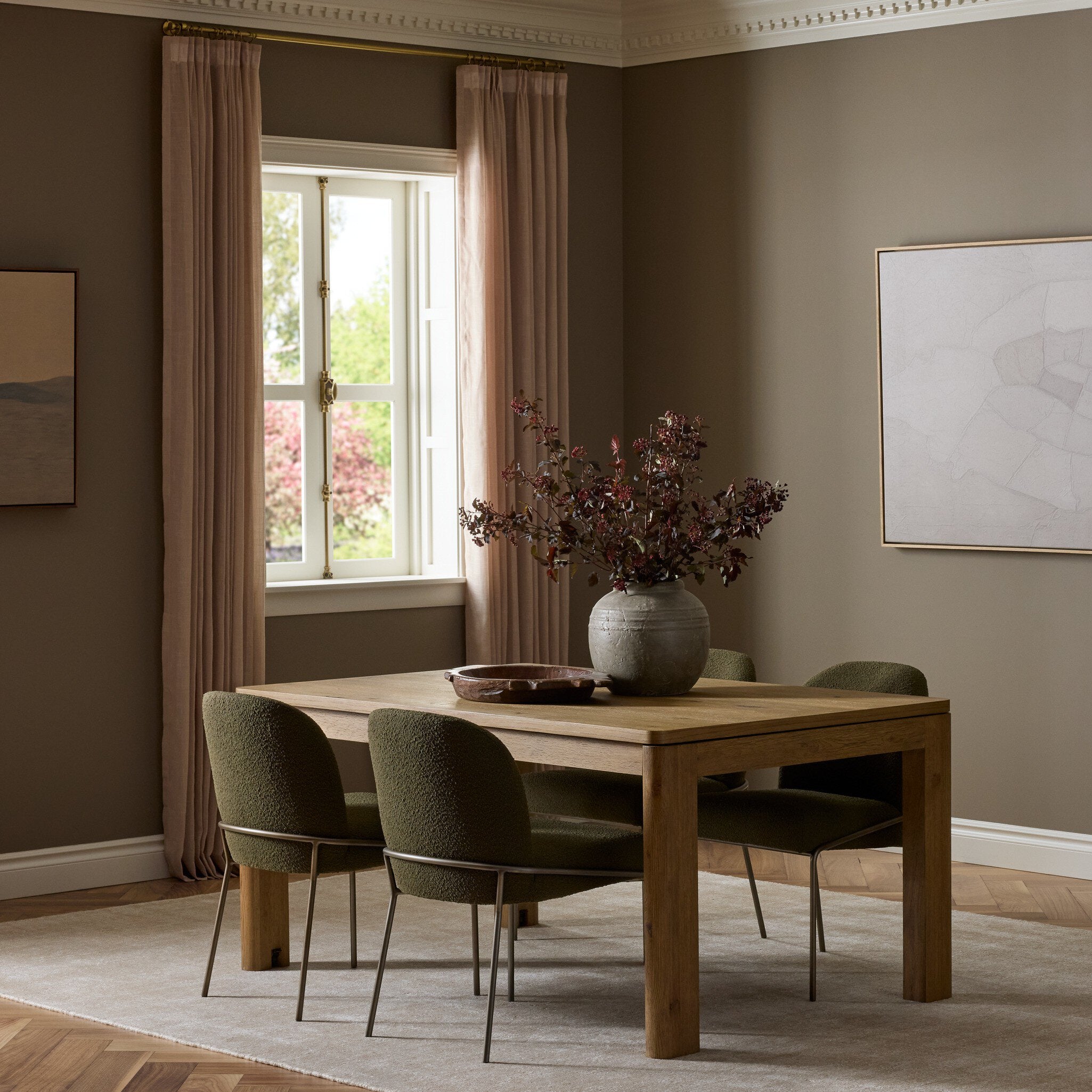 Four Hands Noeline Worn Oak Extension Dining Table styled in a room setting