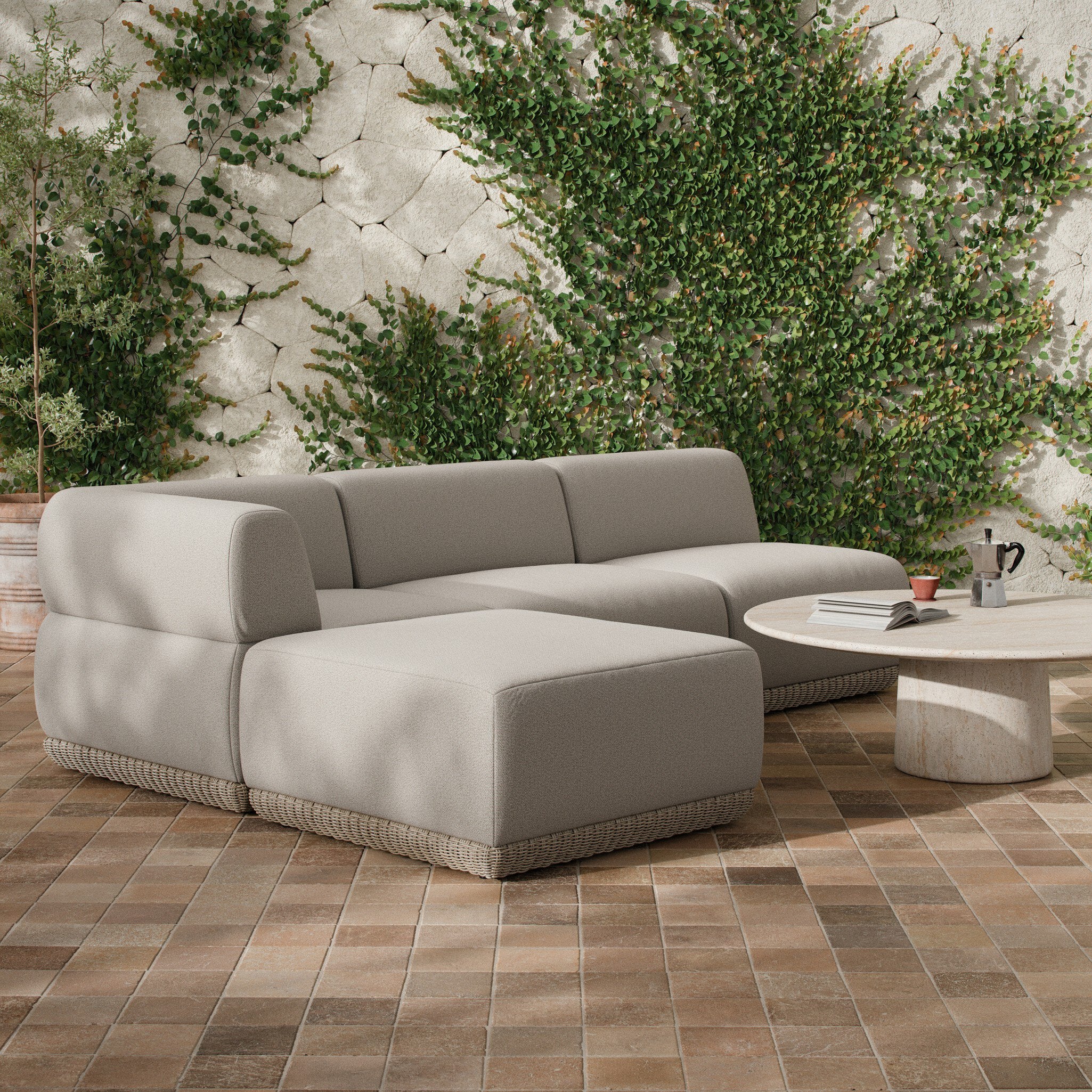 Four Hands Evander Ramiro Ecru 3 Piece Outdoor Sectional Sofa w/Ottoman - styled room setting