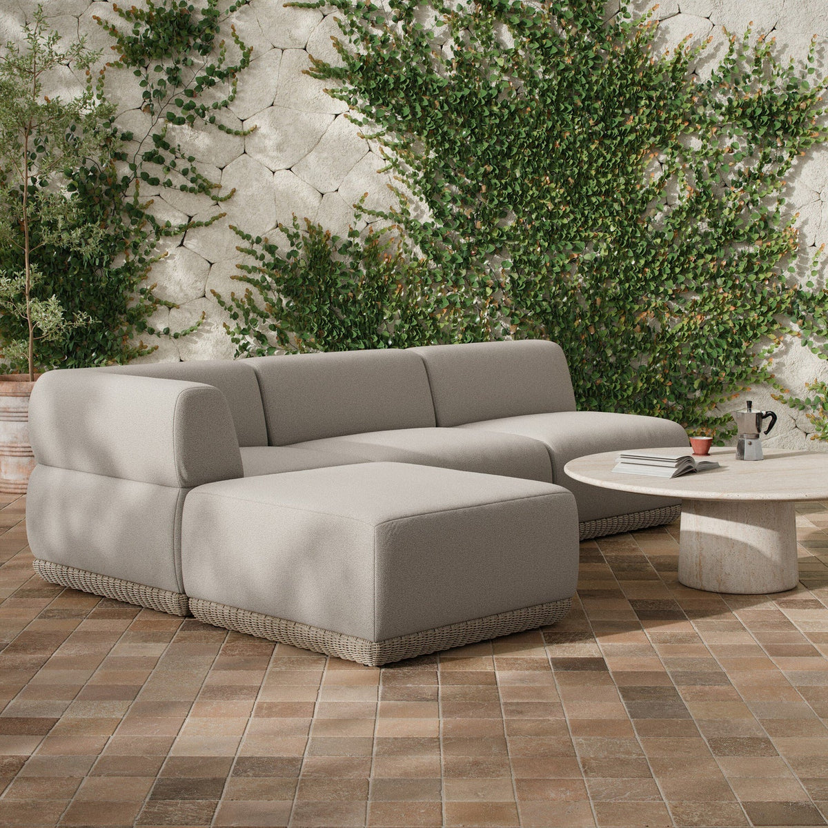 Four Hands Evander Ramiro Ecru 3 Piece Outdoor Sectional Sofa w/Ottoman - styled room setting