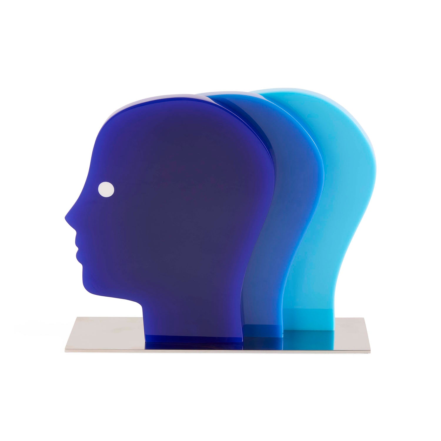 Jonathan Adler Atlas Objet in layered multi-blue acrylic on a nickel base styled in a room