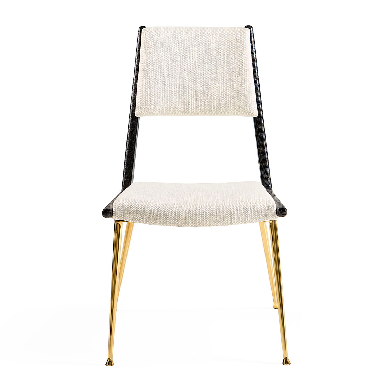 Jonathan Adler The St. Germain dining chair in blackened ash with brass and linen styled in a room
