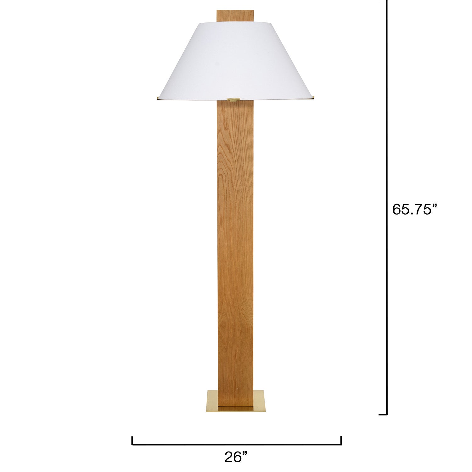 Jamie Young Craftsman oak floor lamp styled beside a leather sofa in a den