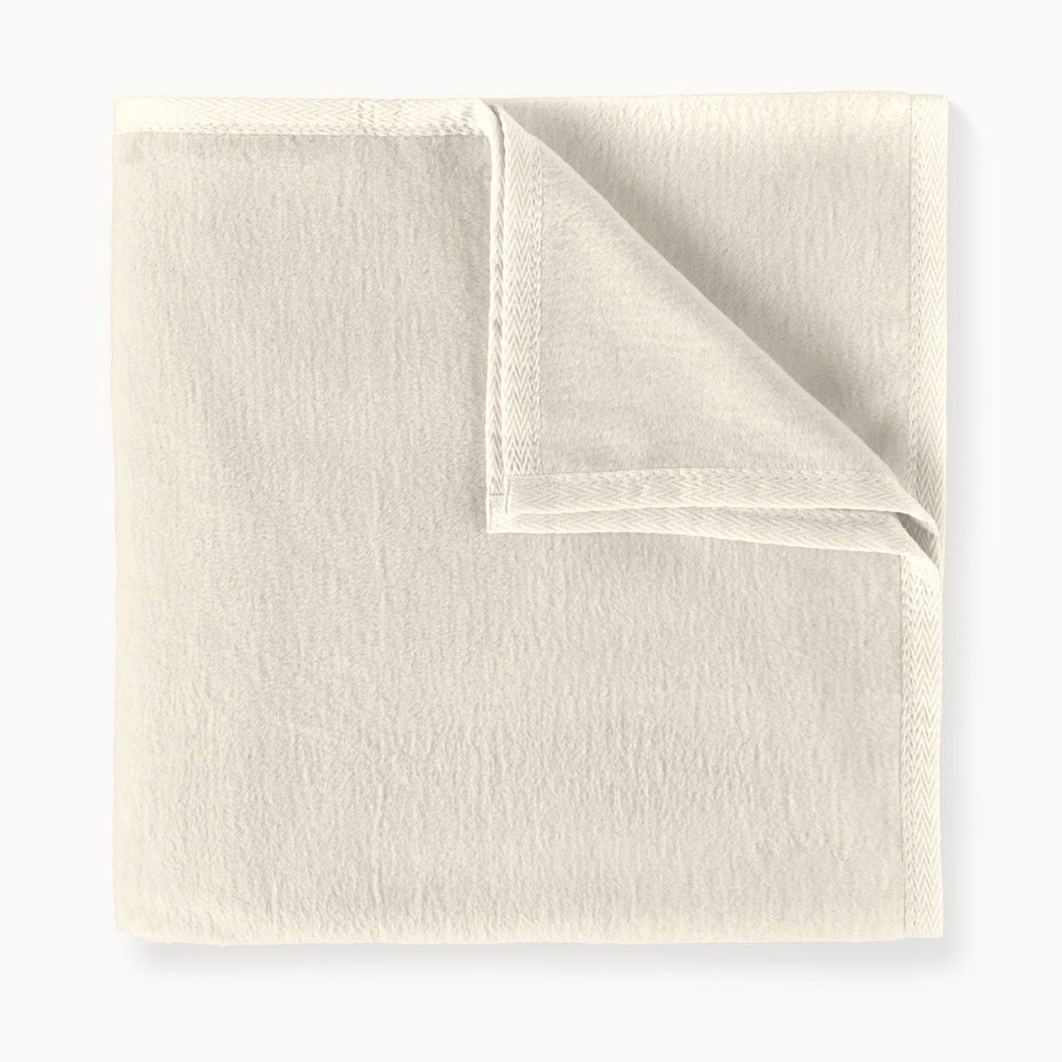 Peacock Alley All Seasons cotton throw blanket draped and layered detail