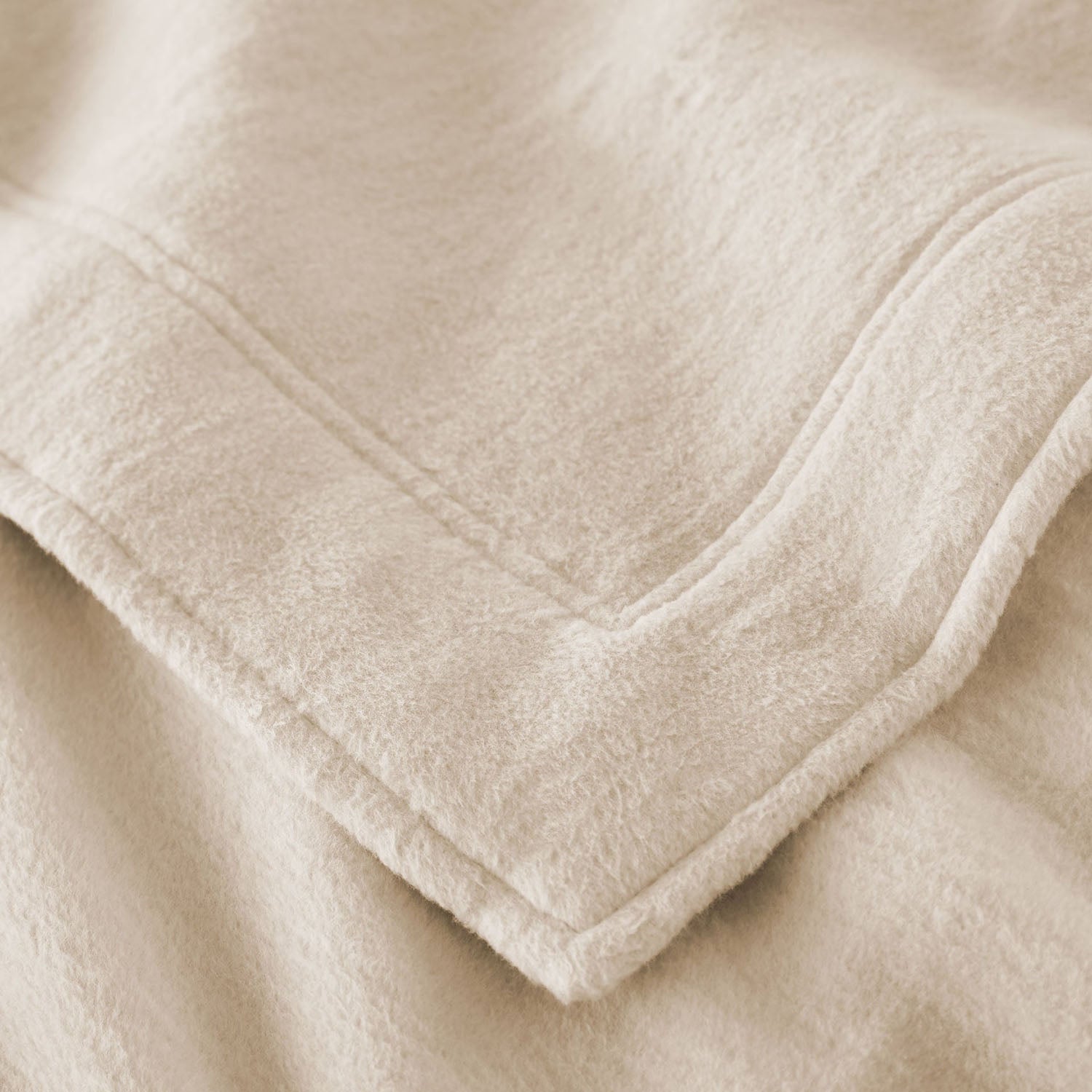 Peacock Alley All Seasons framed brushed cotton throw blanket corner and edge detail
