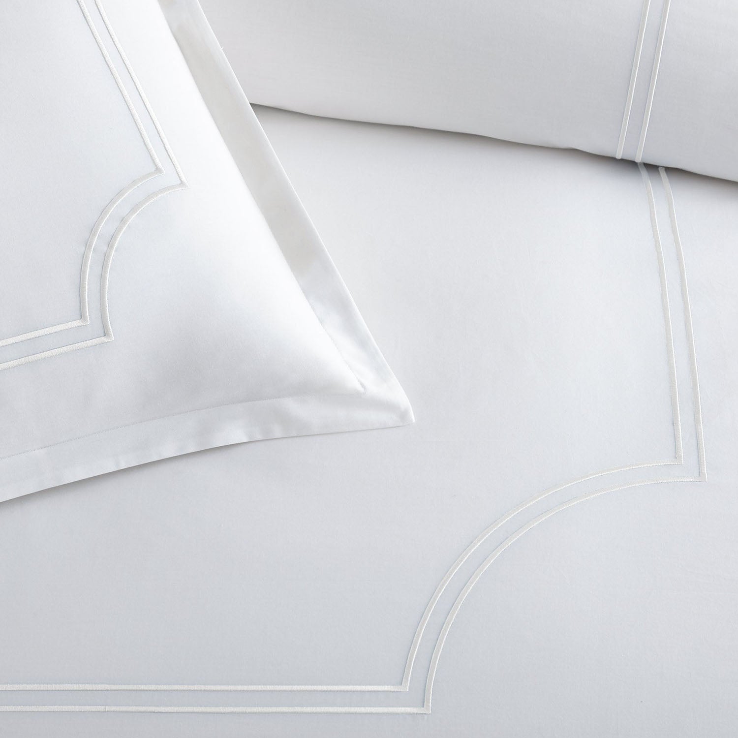 Peacock Alley Deco embroidered cotton percale duvet set corner and edge detail
