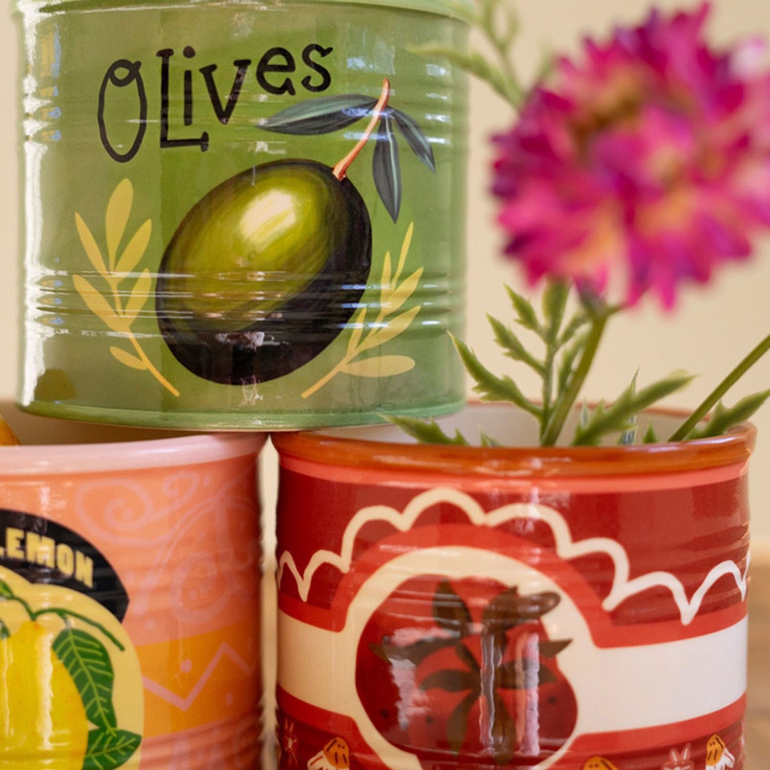 Three-quarter angle of a single ceramic canned good planter