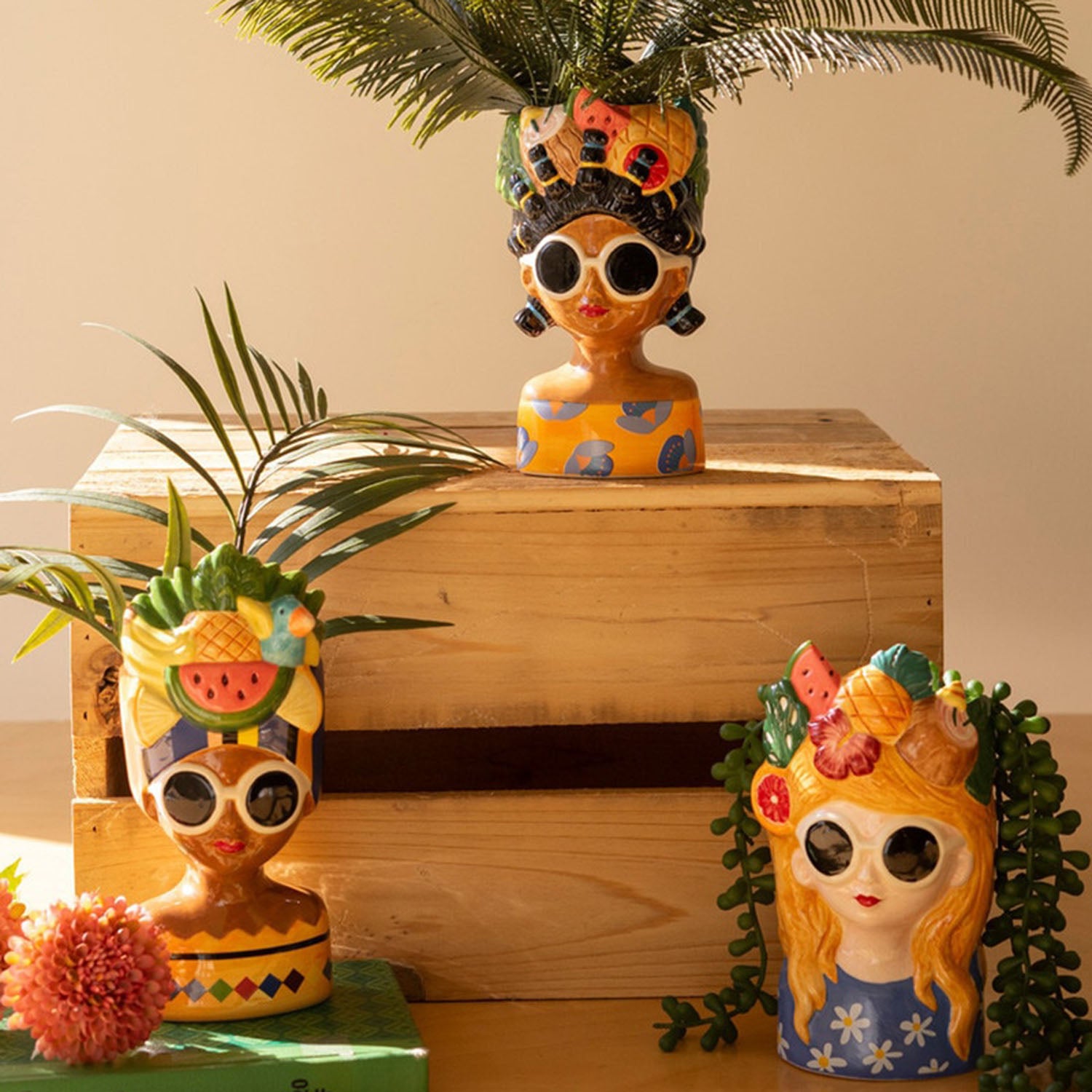 Detail of the sunglasses and fruit crown ceramic details