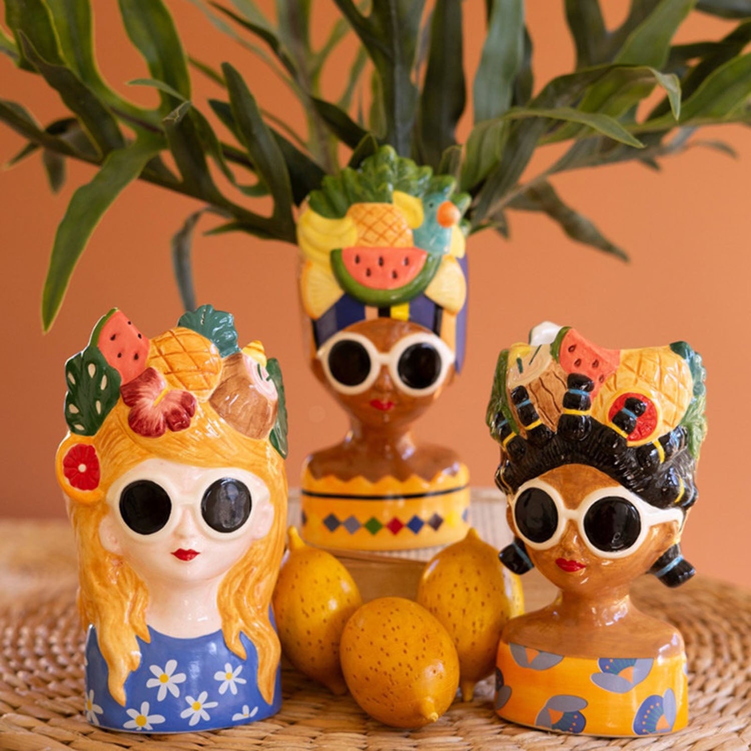 Fancy ladies vases styled with florals on a shelf