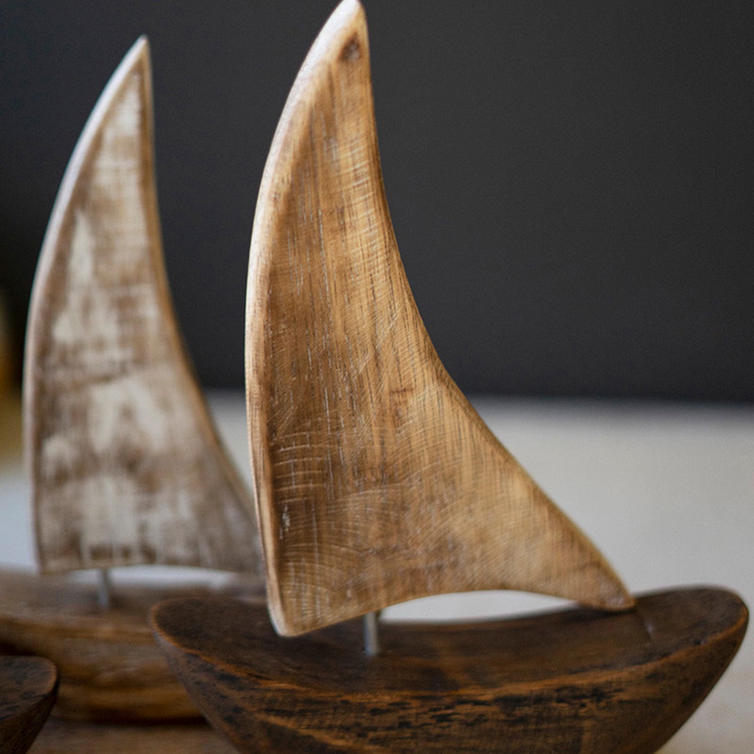 Five Wooden Sailboats on a Base Sculpture