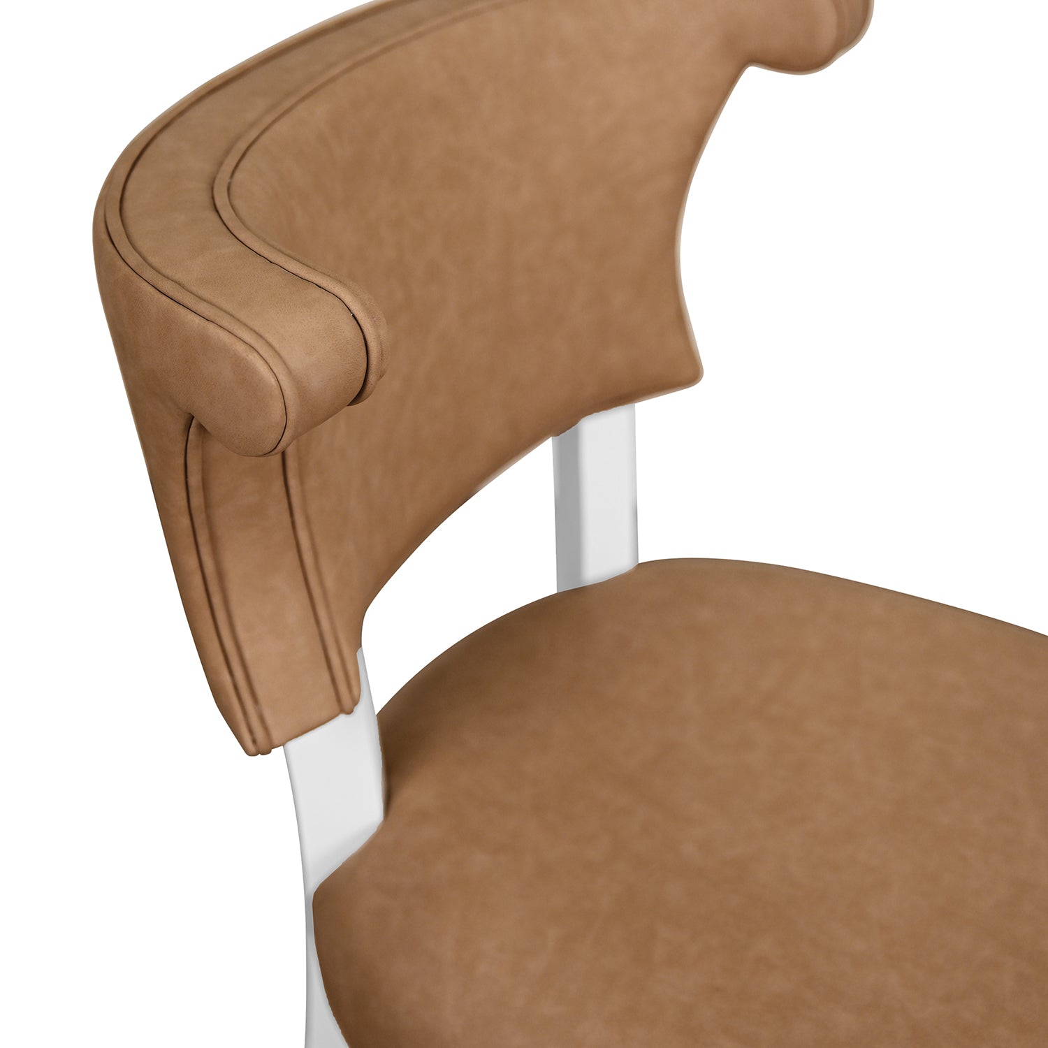 Close-up of the camel faux leather finish on the Eloise Camel Dining Chair