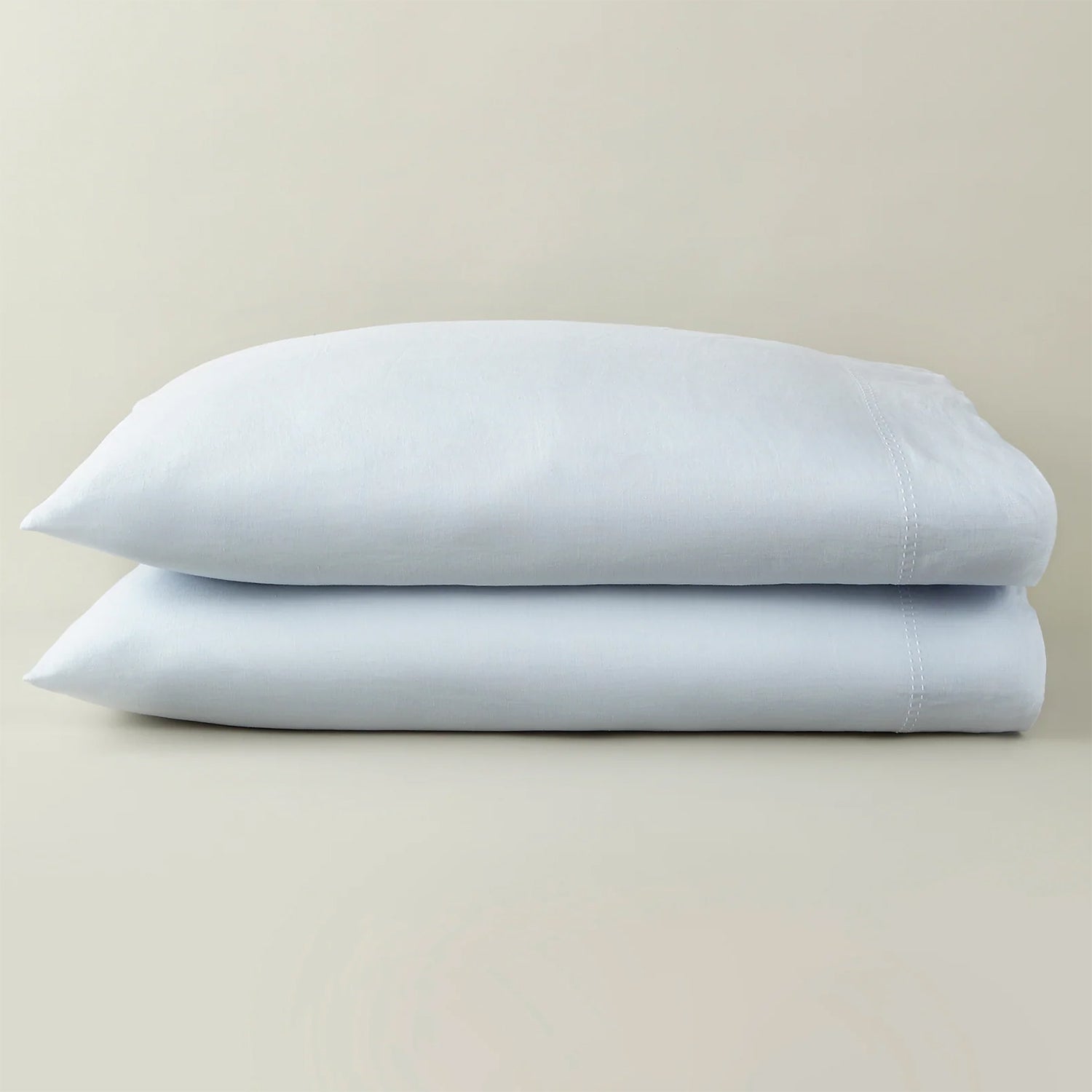 Peacock Alley European washed linen pillowcase set draped and layered detail