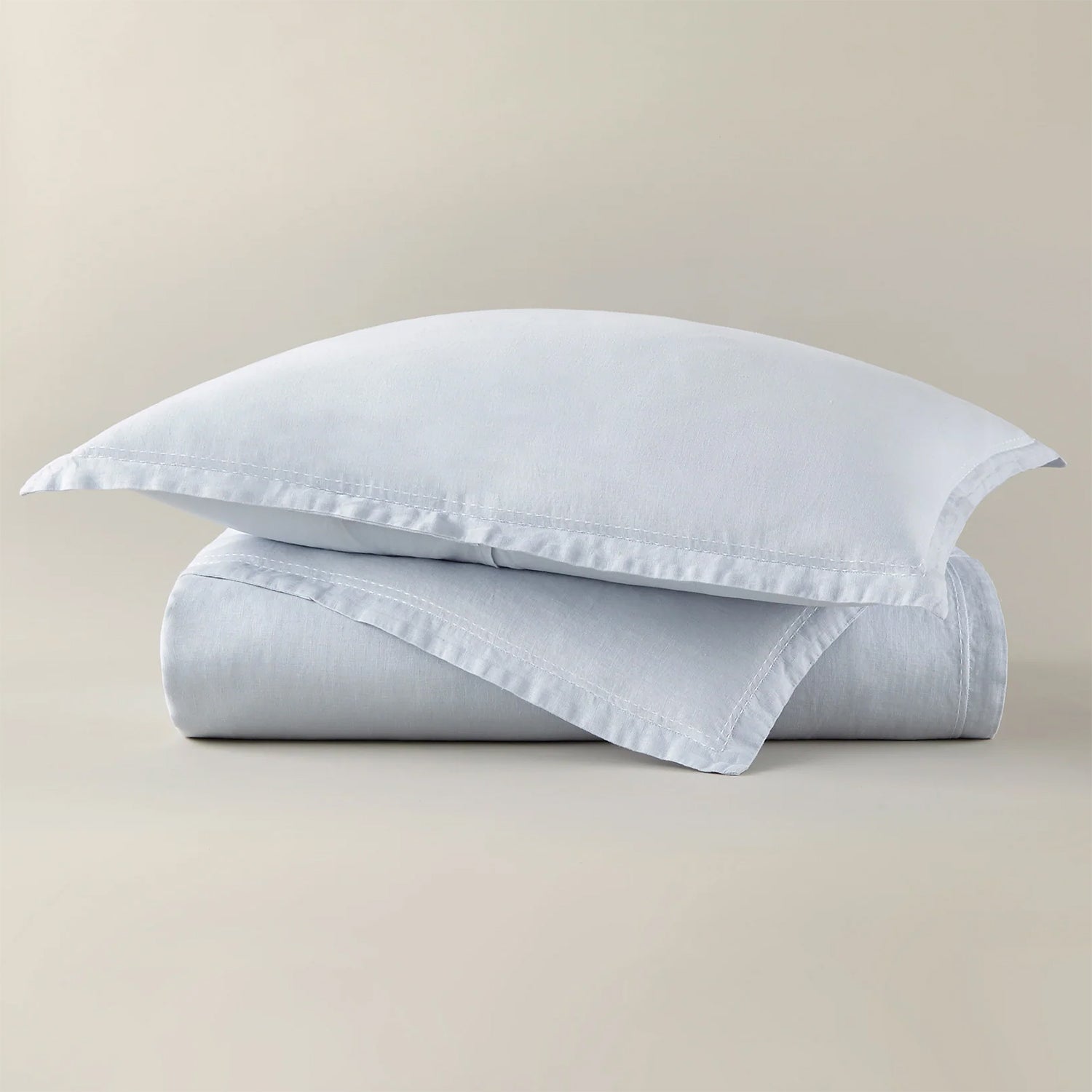 Peacock Alley European washed linen pillow sham gentle draping over a bed