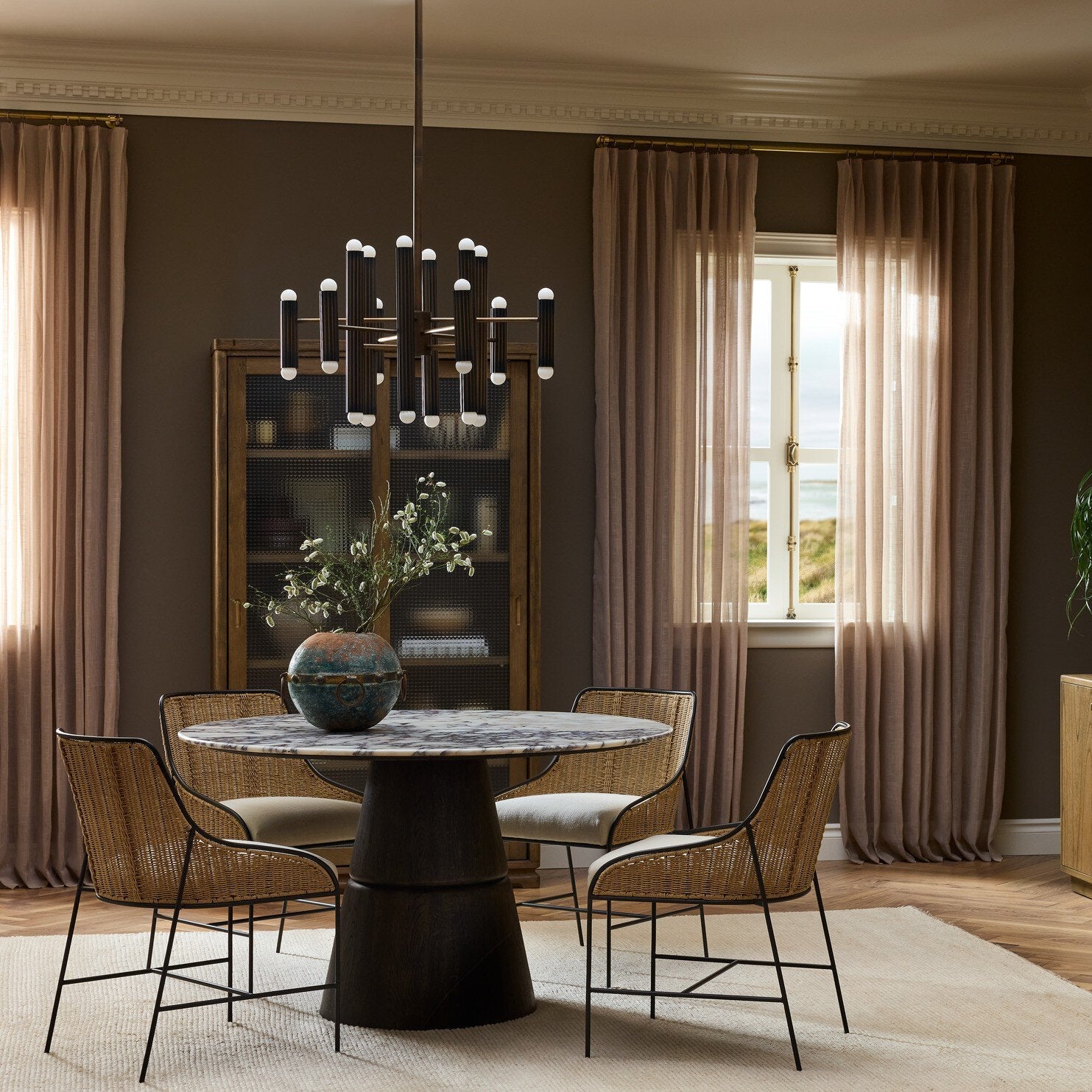 Four Hands Foster Sandy Hemlock Cabinet styled in a room setting, material close-up