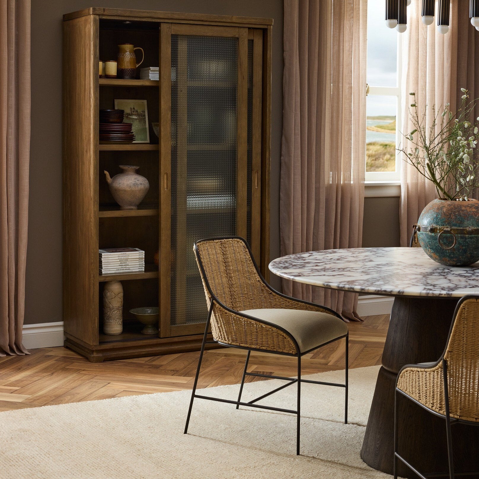 Four Hands Elson Savile Flax Dining Chair in a styled room scene 2