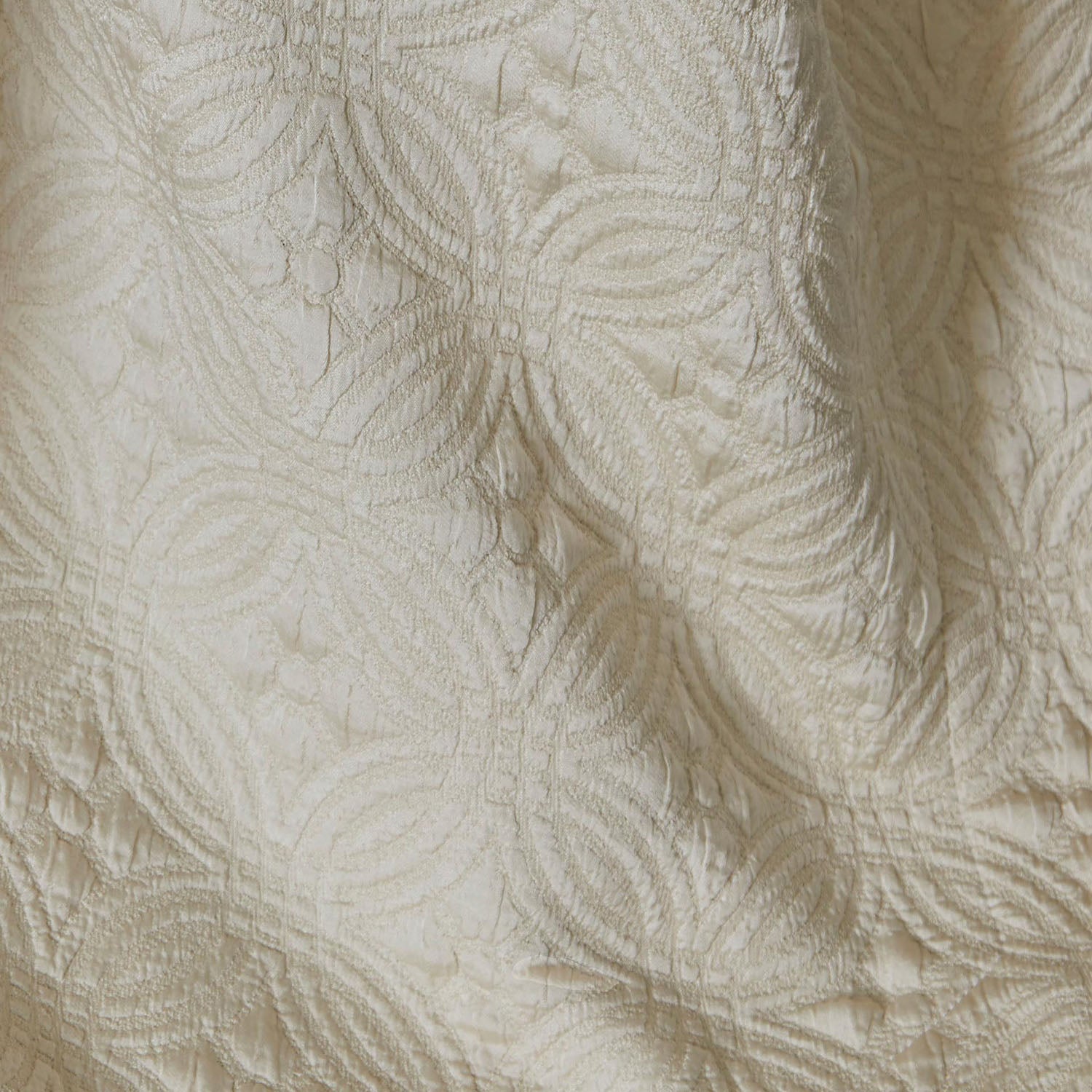Peacock Alley Lucia matelasse cotton-silk coverlet draped and layered detail