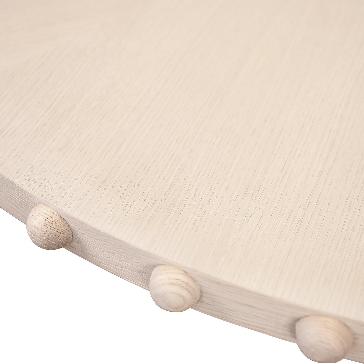 Lucian White Oak Round Dining Table styled in a room setting