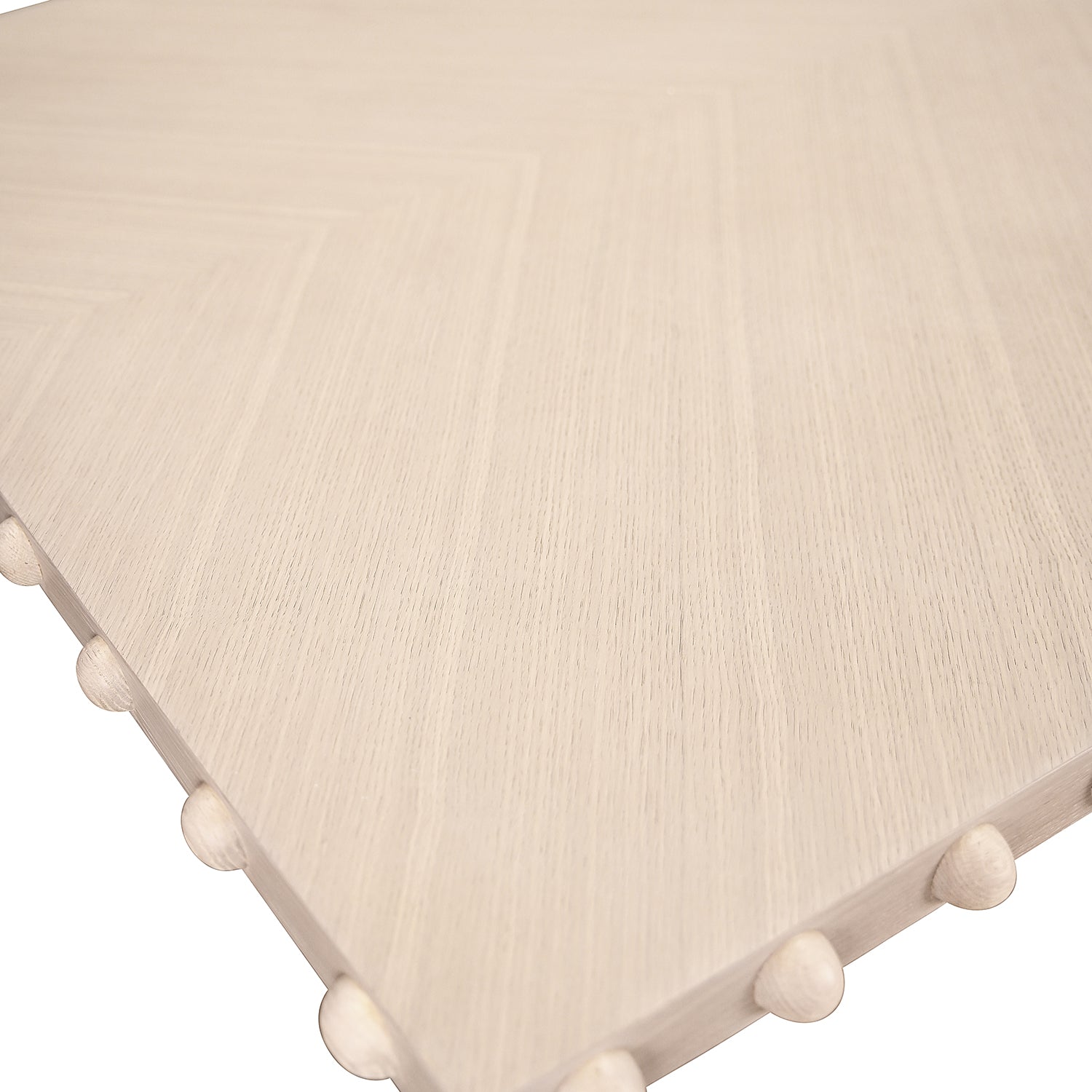 Detail of the Lucian White Oak Rectangle Dining Table hardware and craftsmanship