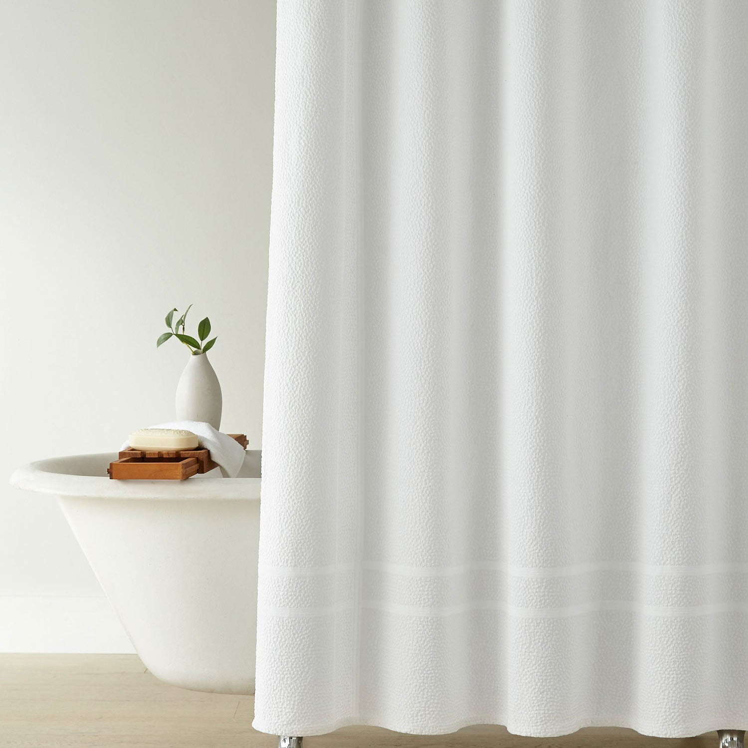 Peacock Alley Montauk matelasse cotton shower curtain draped and layered detail