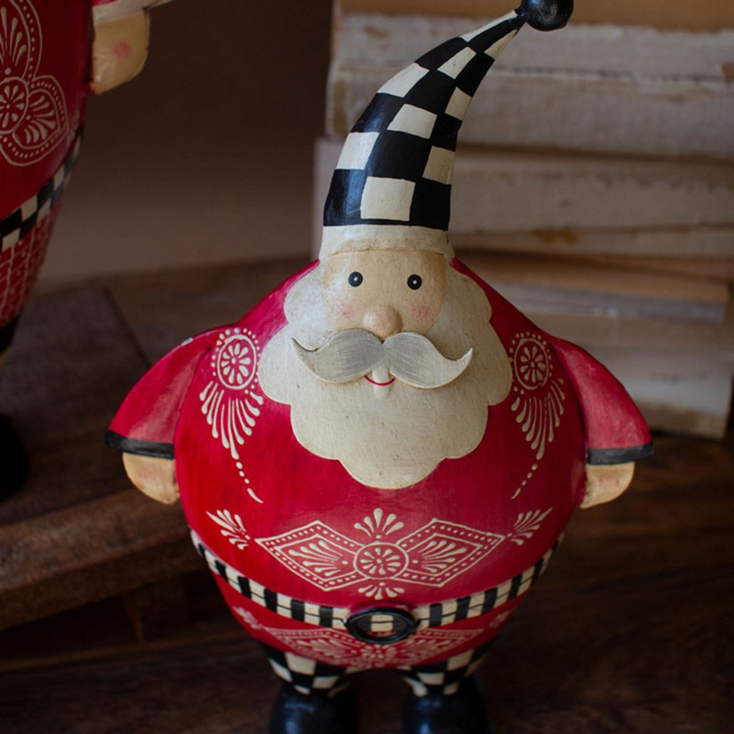 Three-quarter angle of the large checkered Santa showing its belt pattern