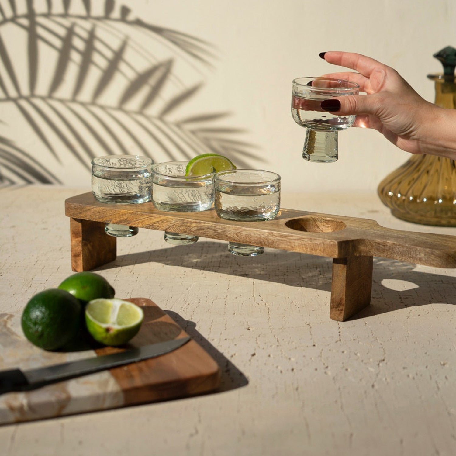 Tequila Flight with Four Glasses on a Wooden Tray