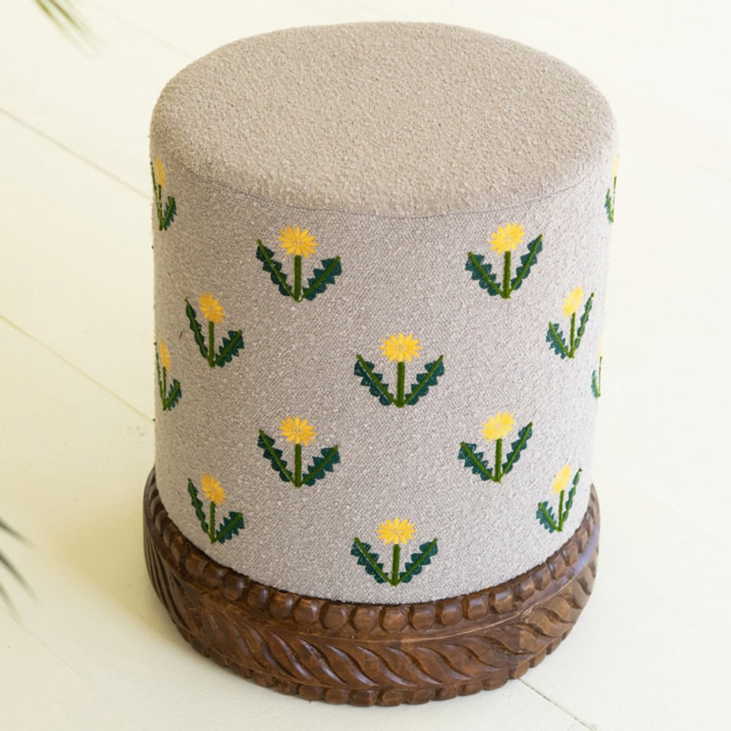 Upholstered Gray Ottoman with Embroidered Detail