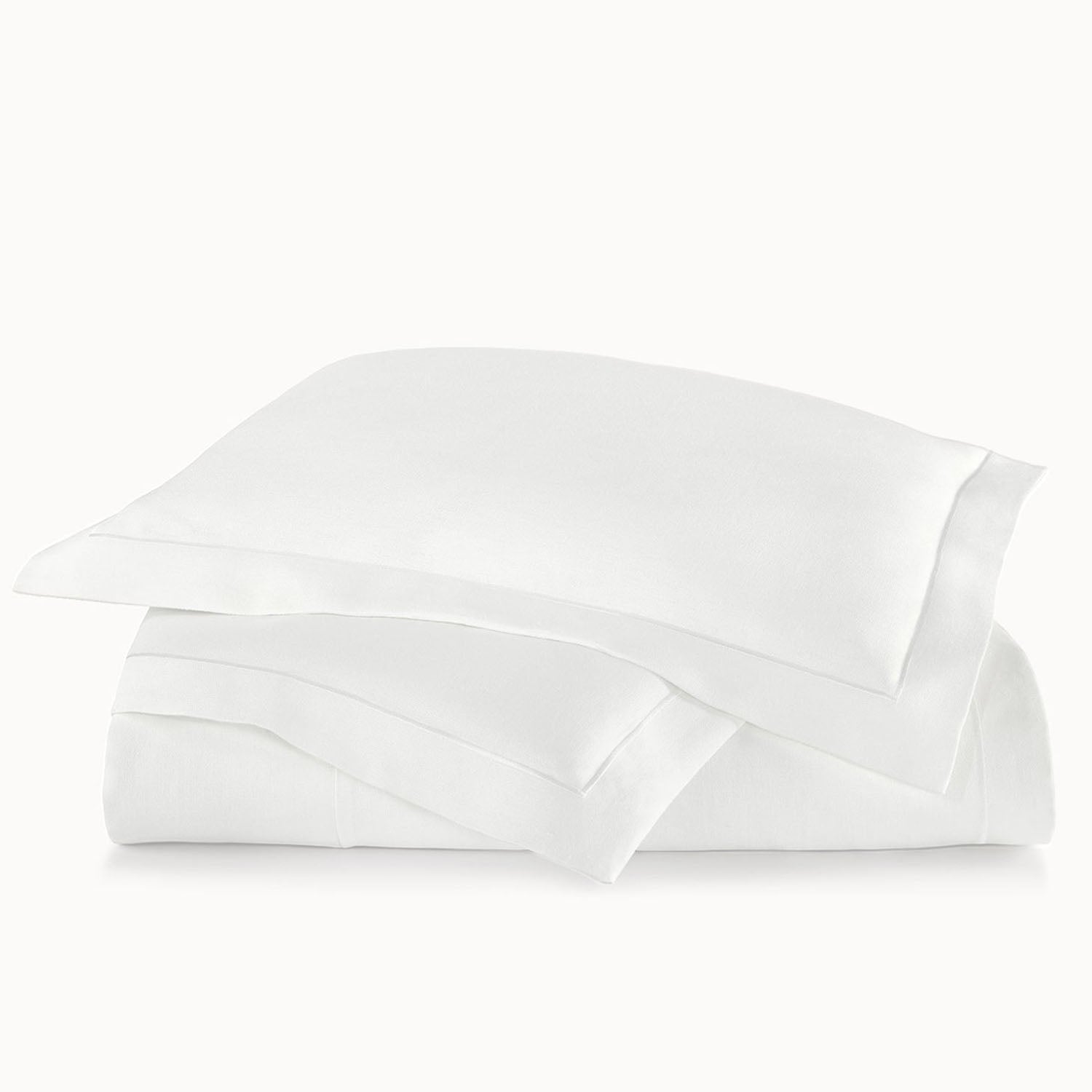 Peacock Alley Rio Satin Stitch Coverlet 100% linen satin stitch coverlet, styled with coordinating shams and pillows