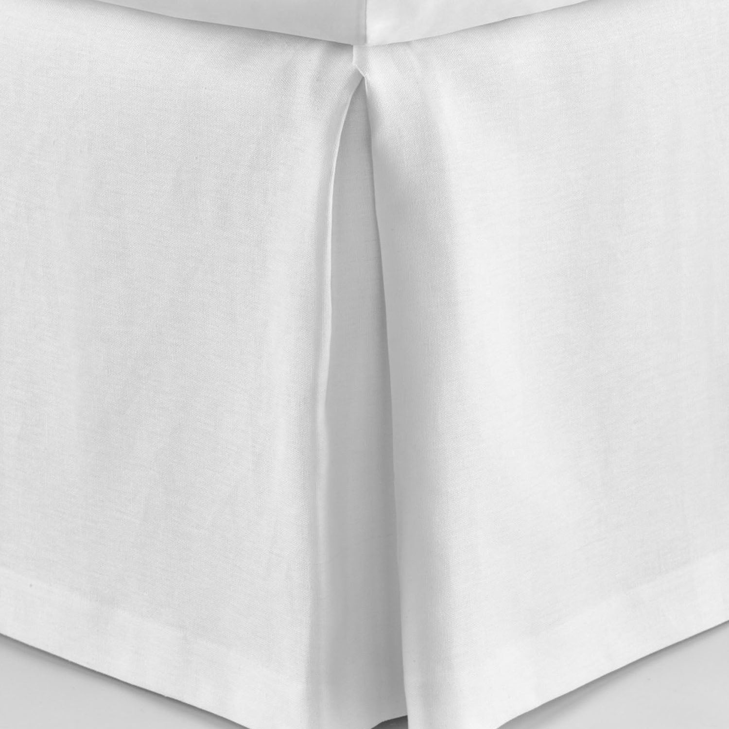 Peacock Alley Rio linen bedskirt stack of neatly folded linens