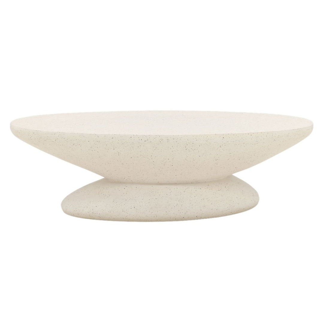 Jaela outdoor coffee table styled on a patio