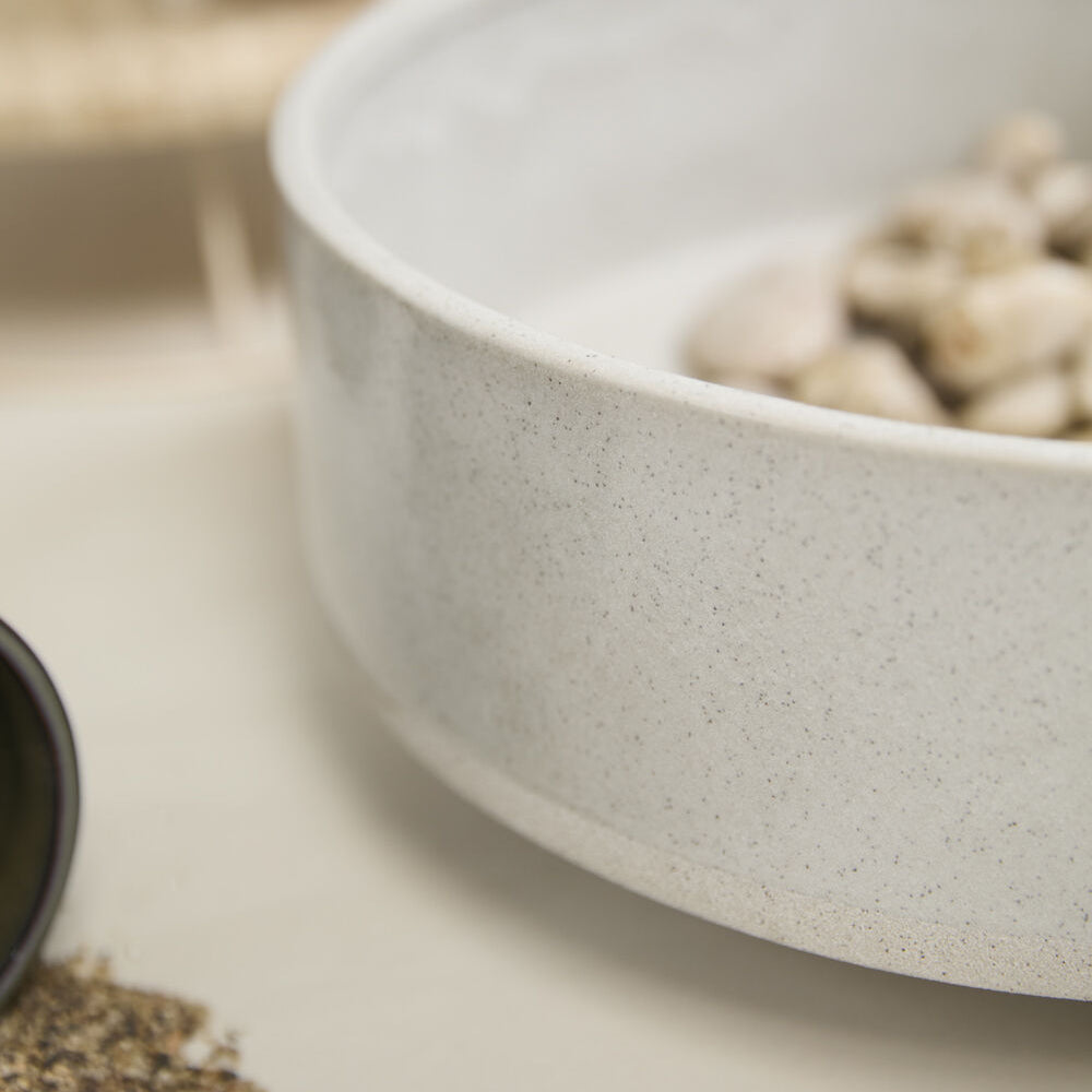 Inventor Bowl detail view, speckled off-white ceramic bowl